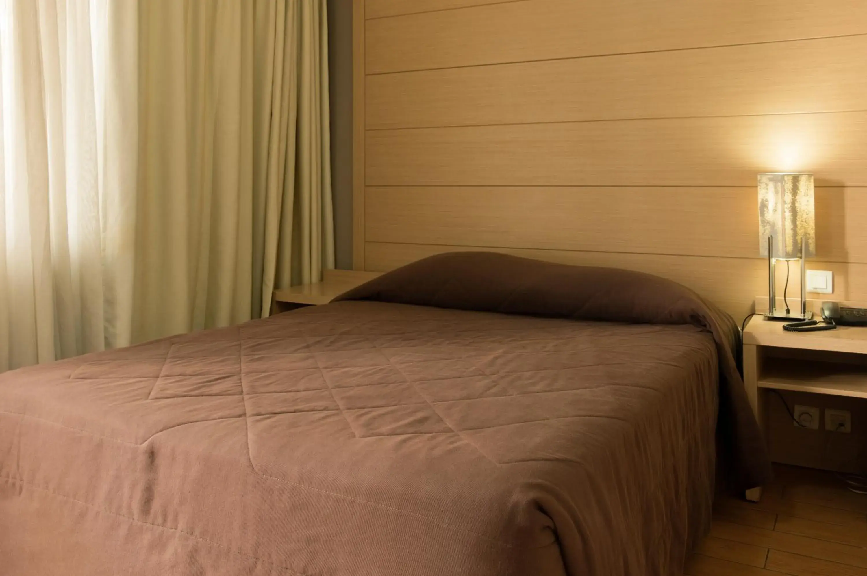 Bed in Parnon Hotel