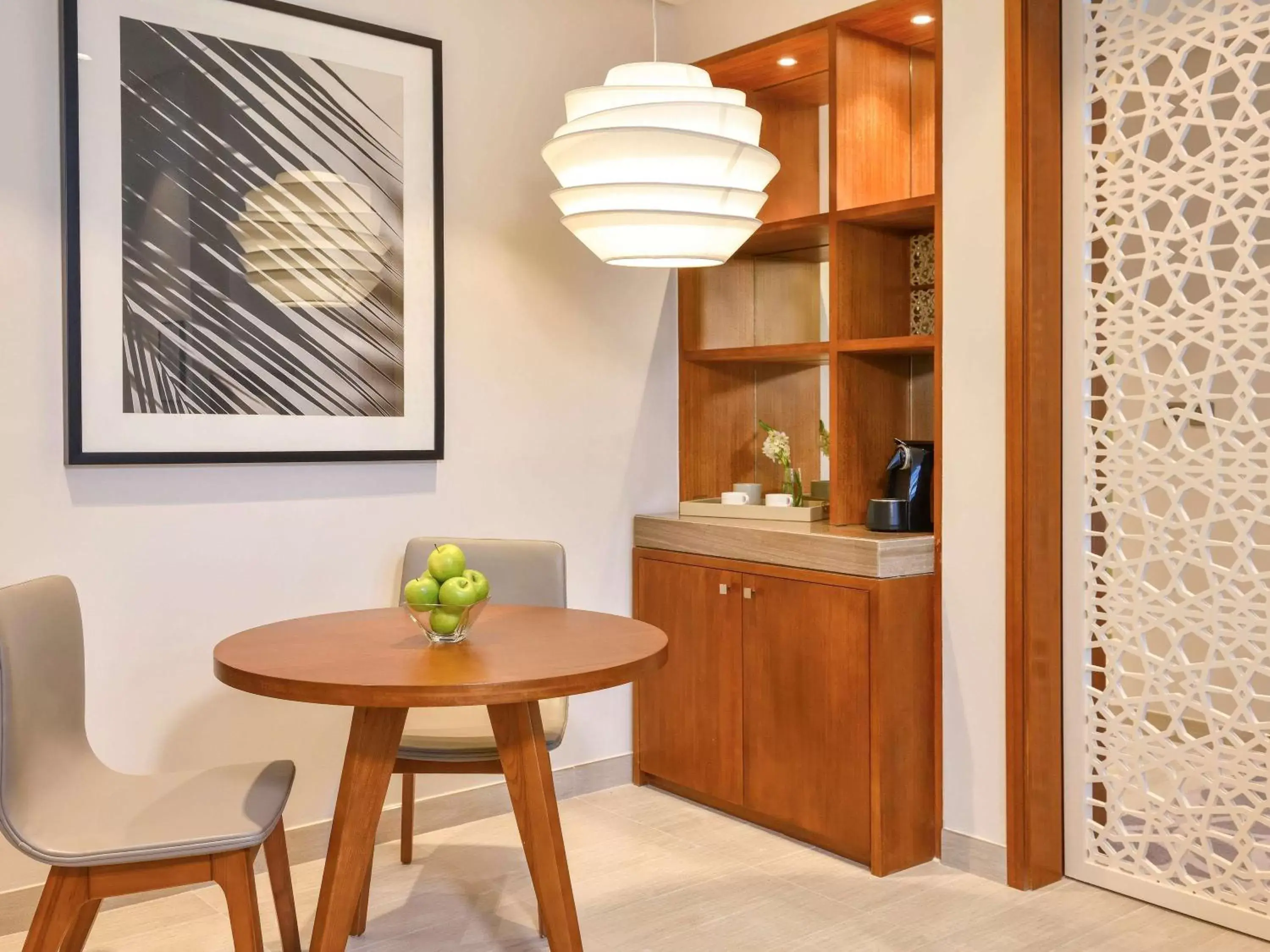 Living room, Kitchen/Kitchenette in Grand Mercure Dubai