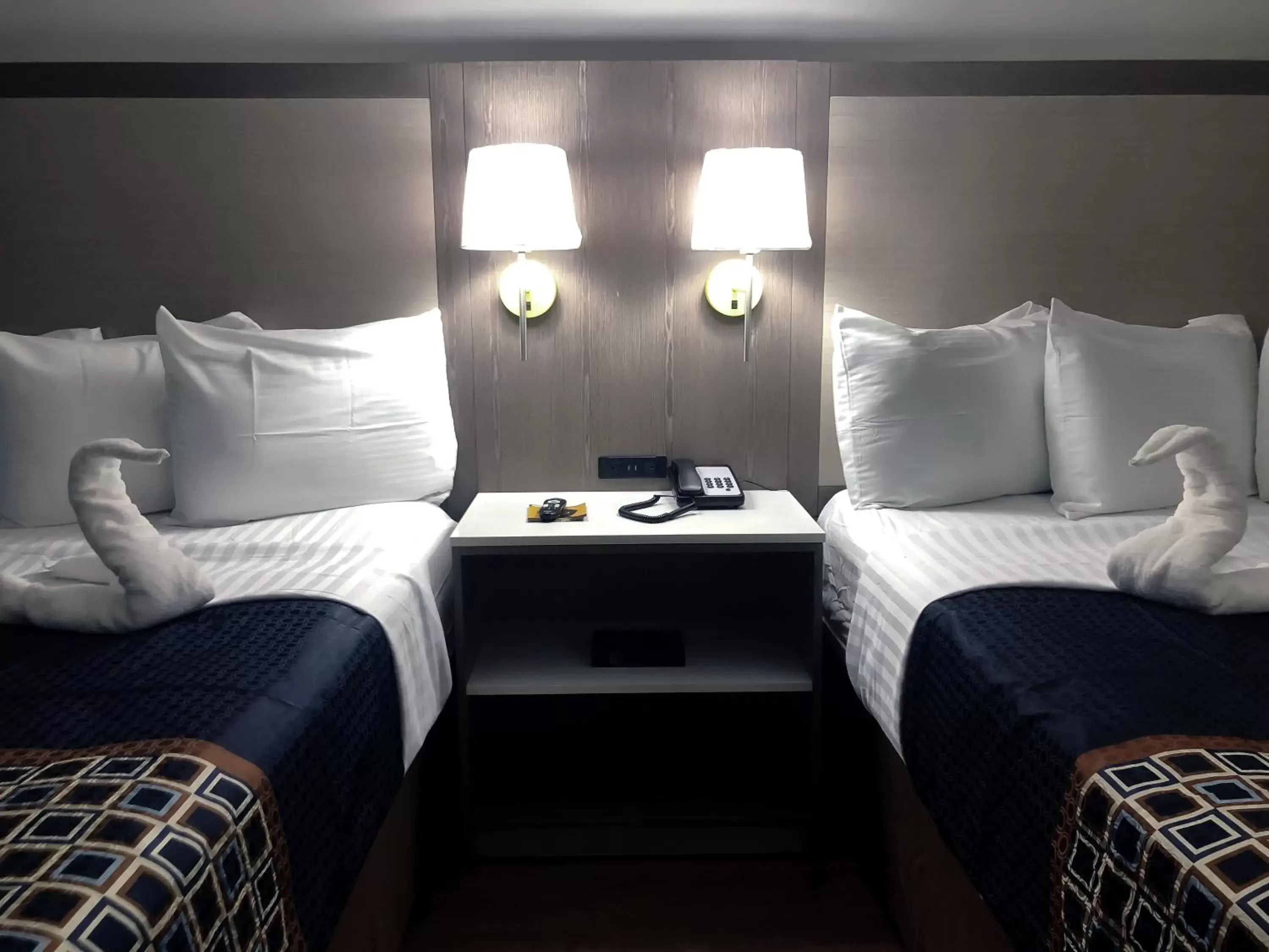 Bed in Destin Inn & Suites