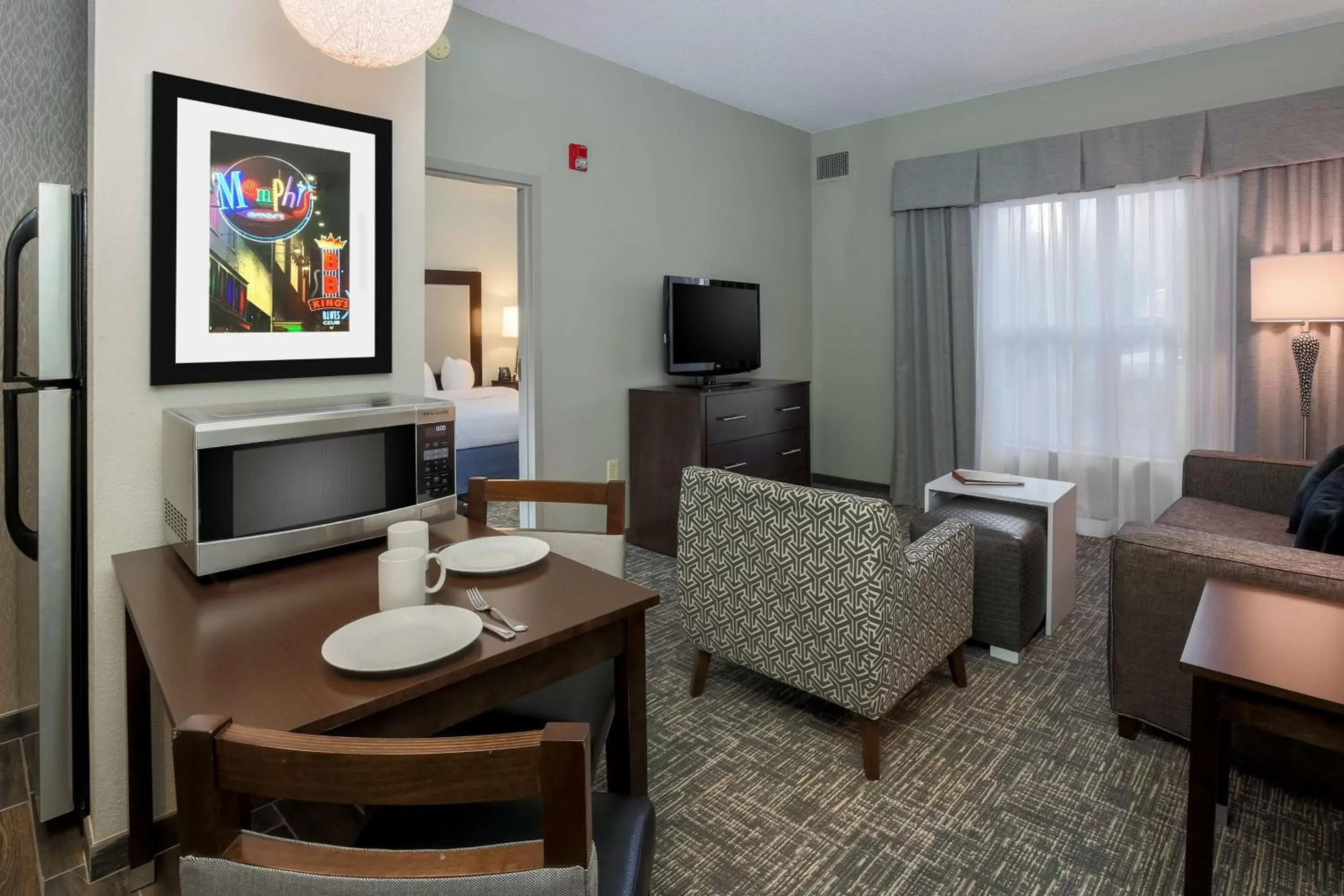 Living room, TV/Entertainment Center in Homewood Suites by Hilton Southwind - Hacks Cross