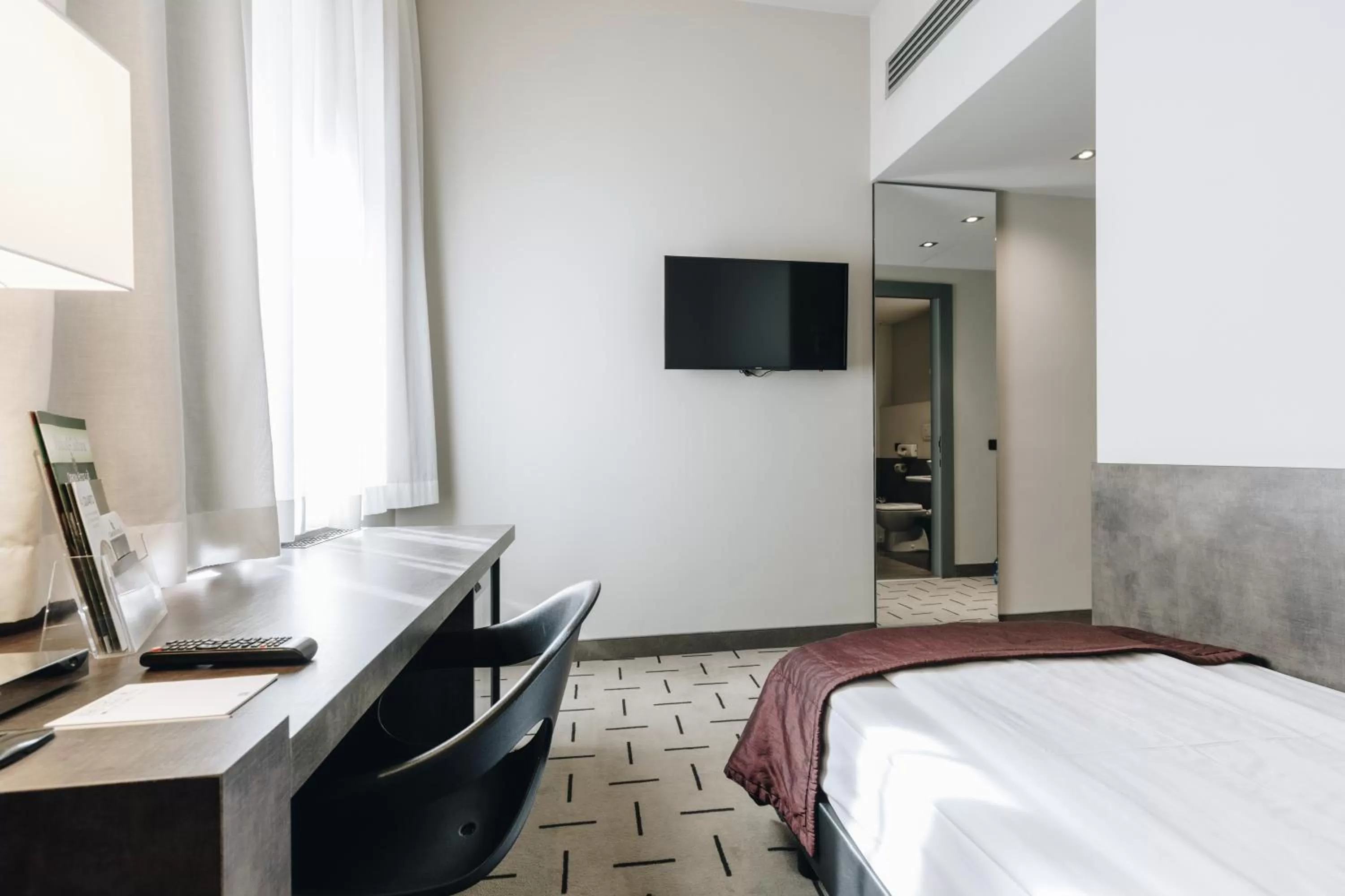 Bed in Hotel Continental