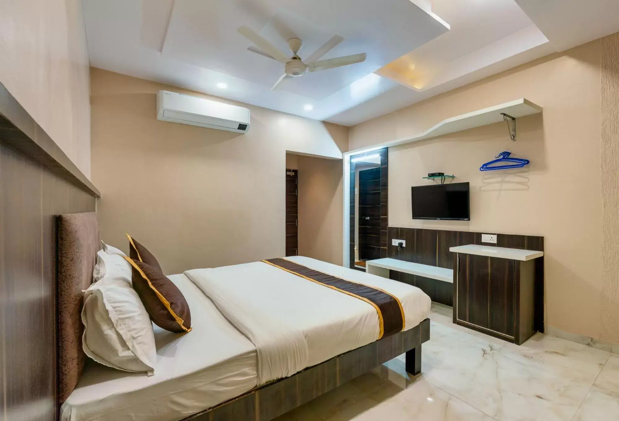 View (from property/room), Bed in Hotel Aatithya Satkar Near Mahalaxmi Temple View (from property/room), Bed in Hotel Aatithya Satkar Near Mahalaxmi Temple