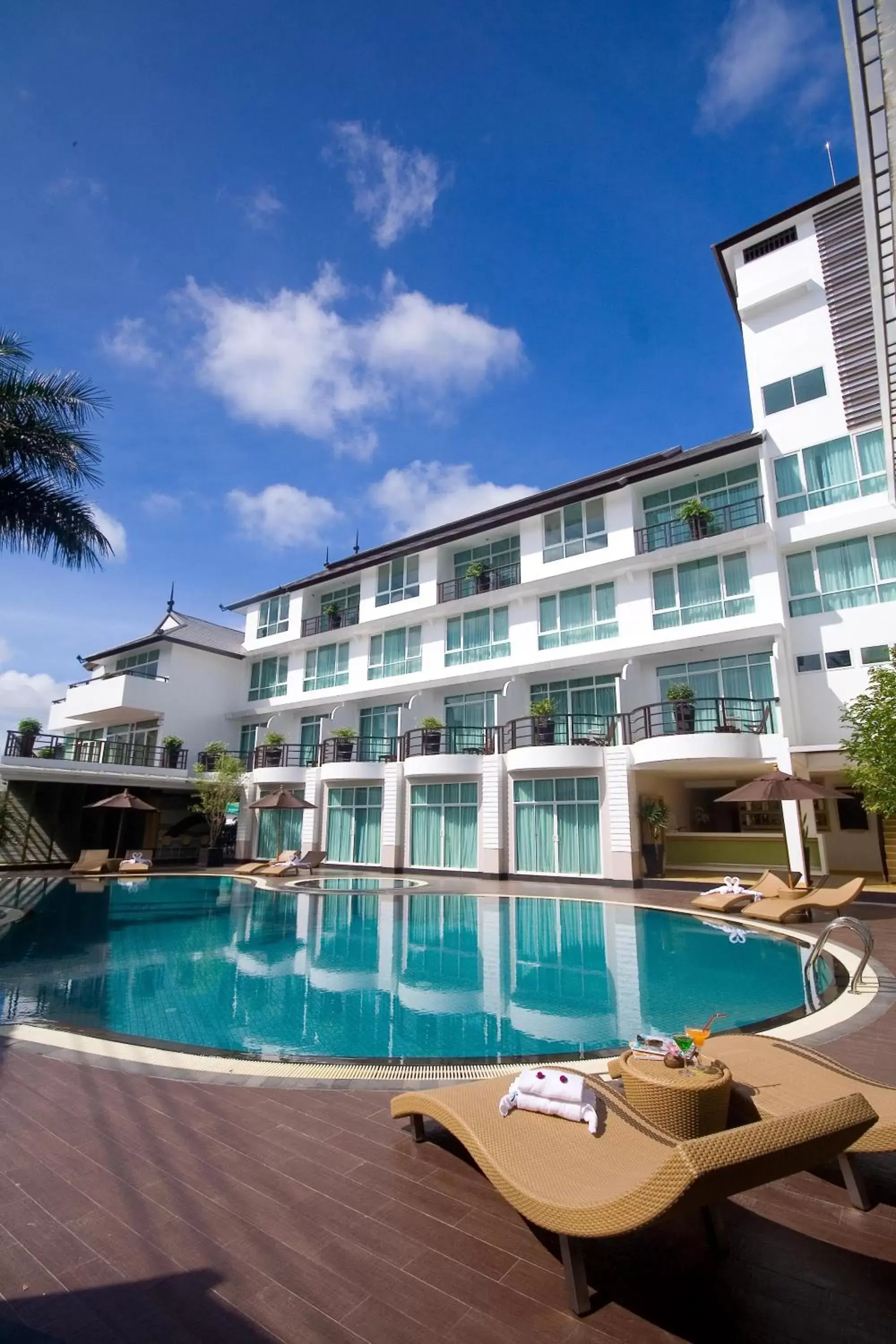 Swimming pool, Property Building in A-Te Chumphon Hotel - SHA Plus