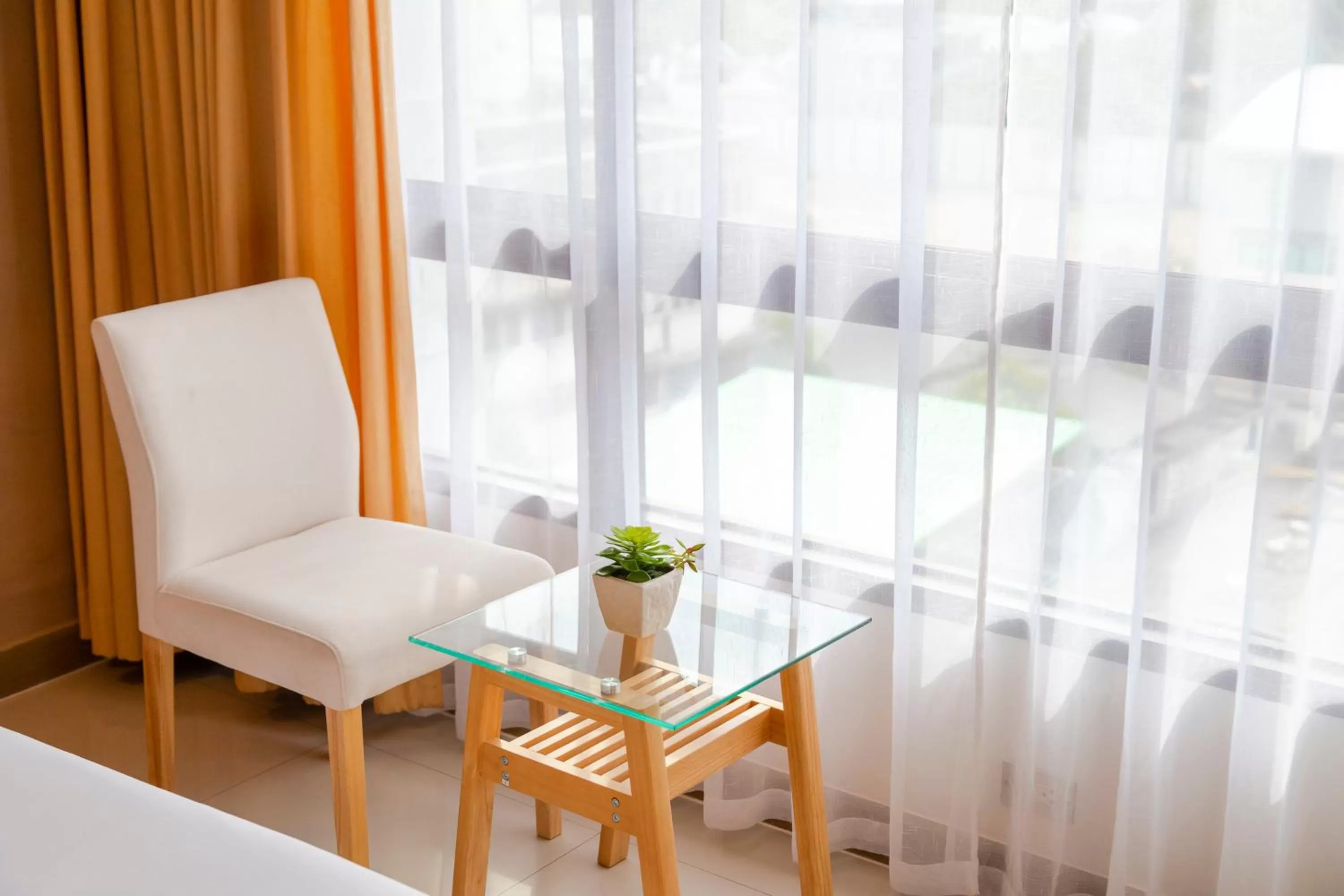 Living room in Pinnacle Lumpinee Park Hotel