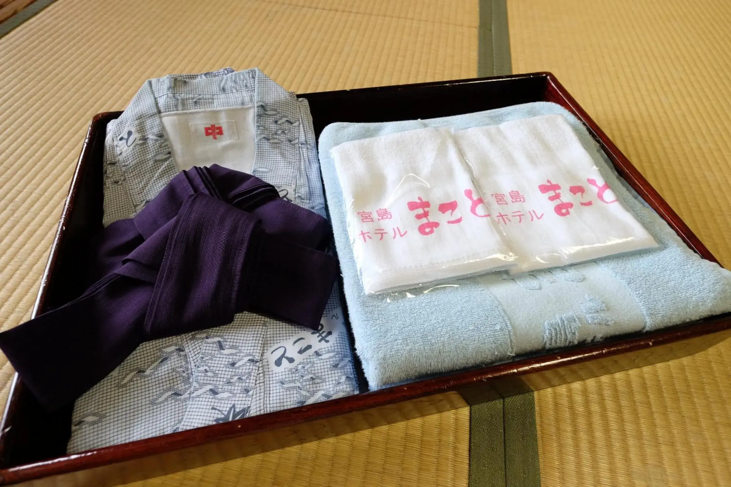 Decorative detail, Bed in Miyajima Hotel Makoto