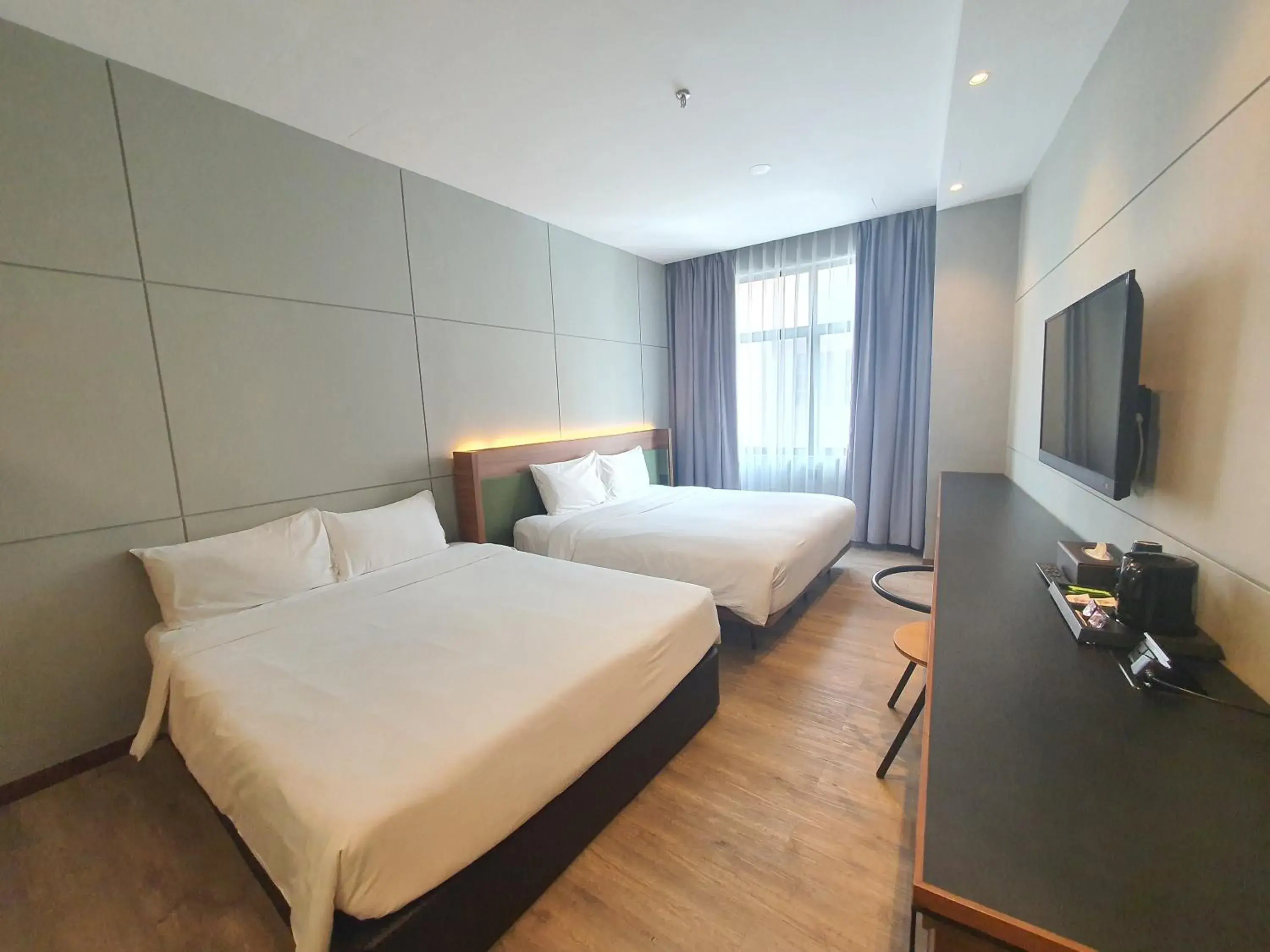 Bed in Ceria Hotel