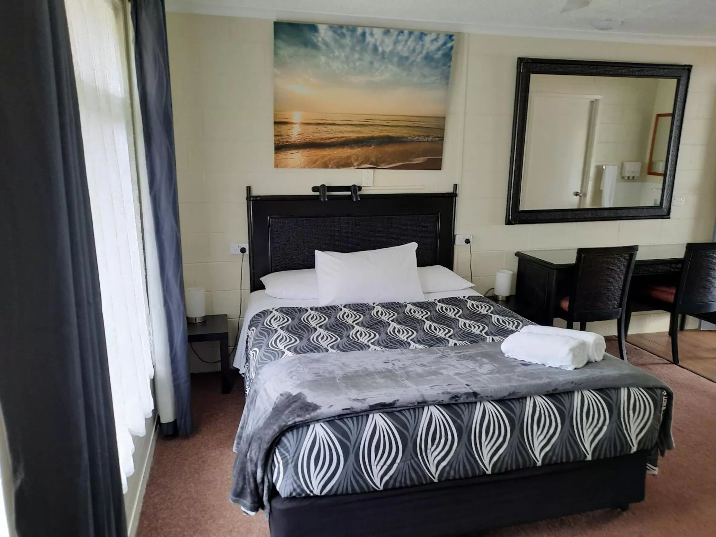 Bed in Flying Spur Motel