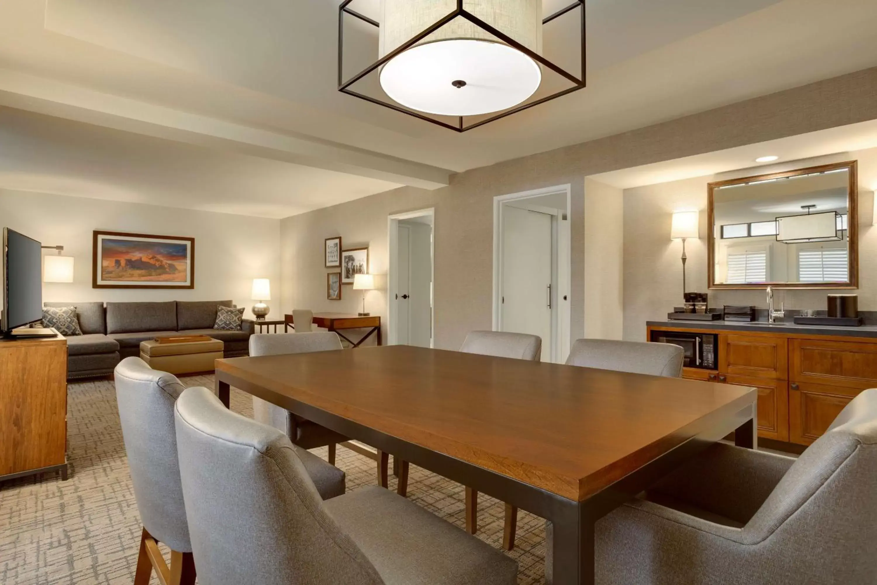 Living room, Dining Area in Embassy Suites by Hilton Scottsdale Resort