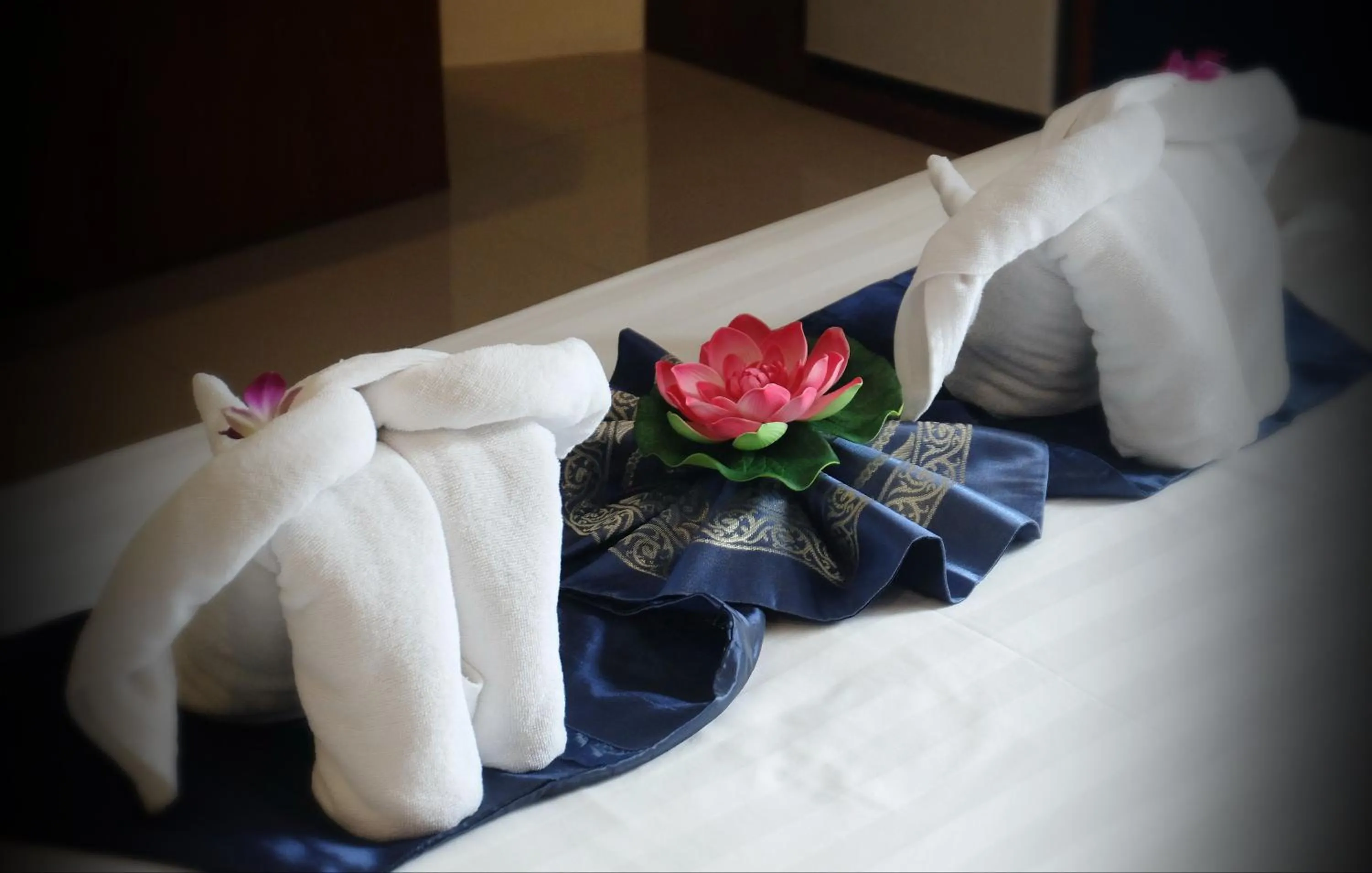 Bed in Calypso Patong Hotel