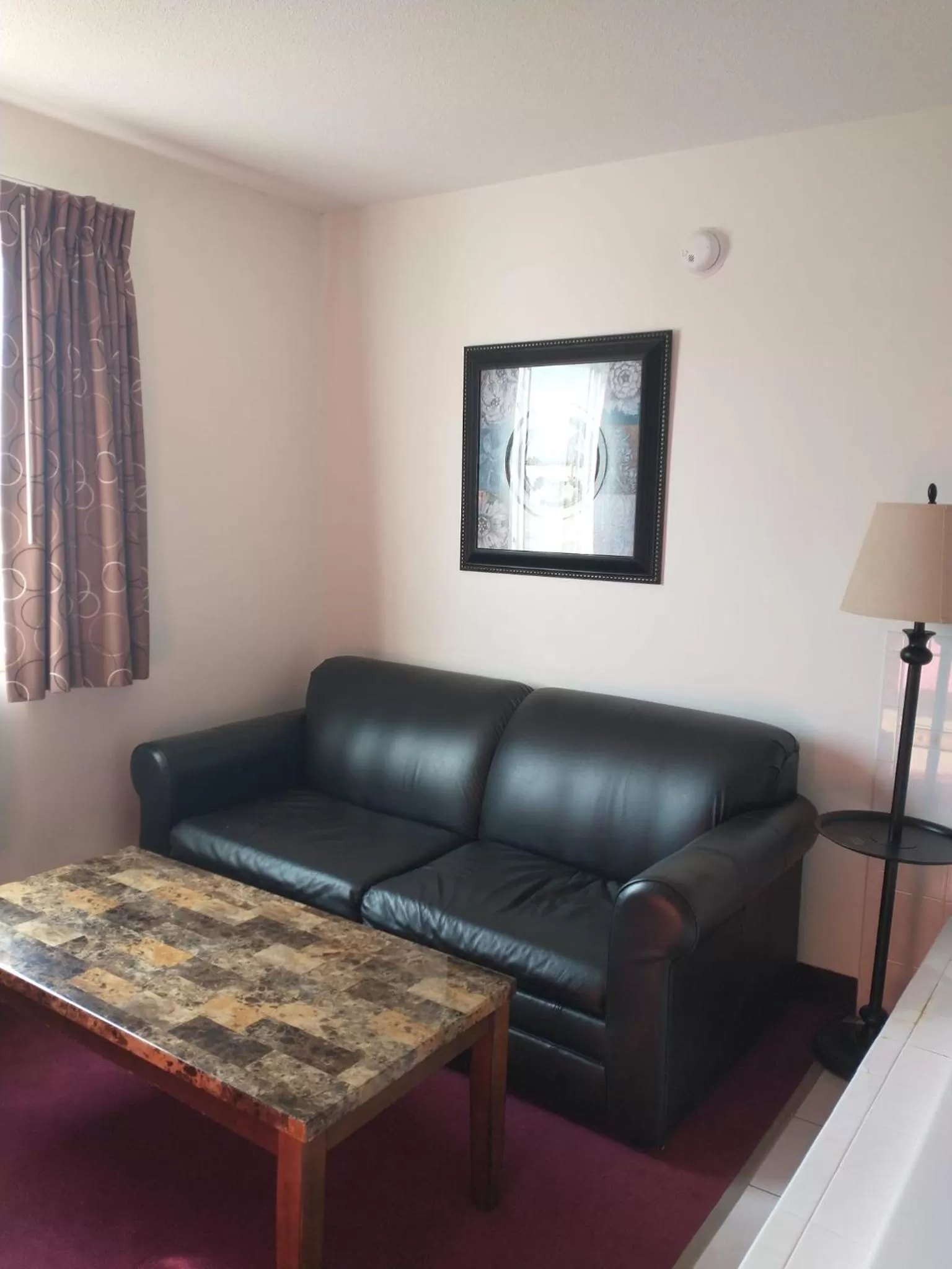 Seating area in Sauk River Inn & Suites, a Travelodge by Wyndham