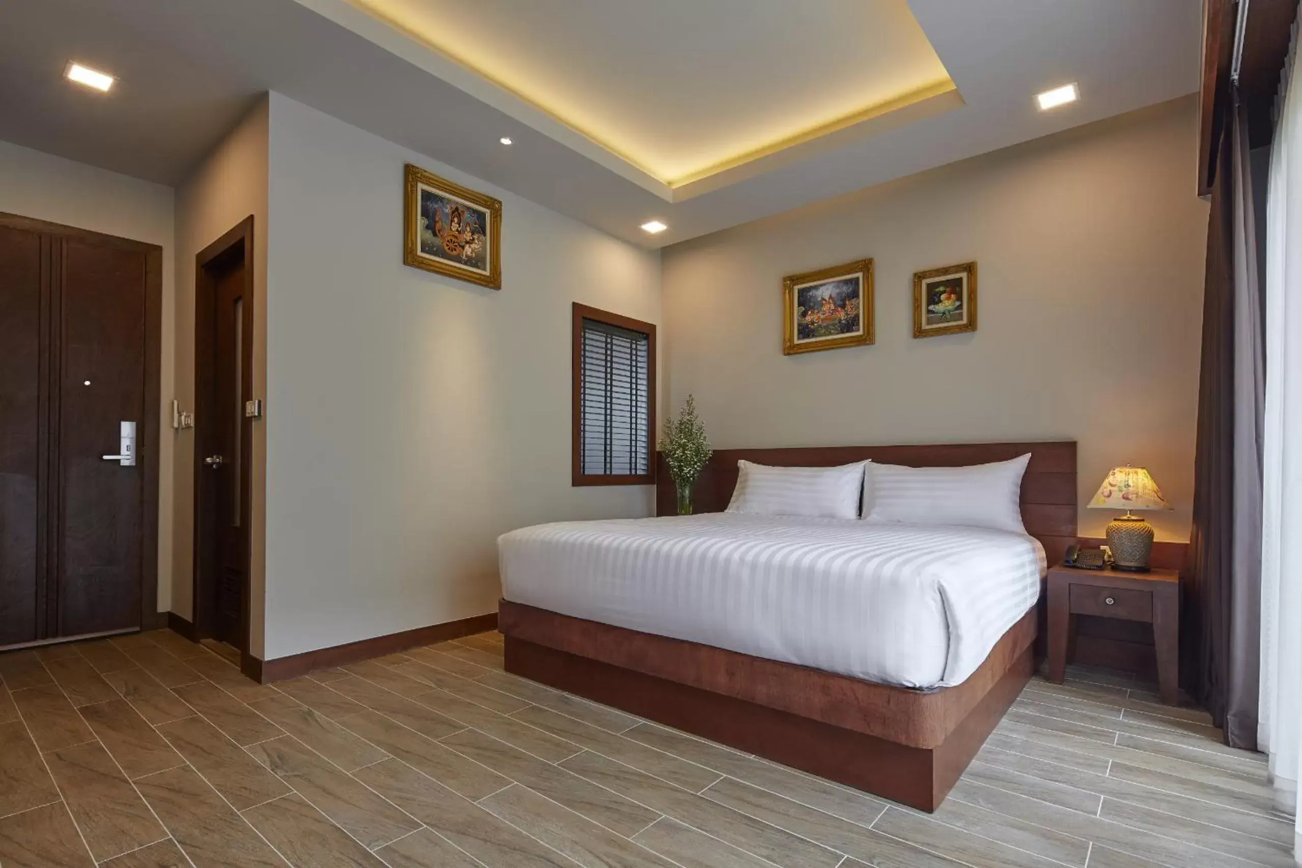 Bed in The Agate Pattaya Boutique Resort