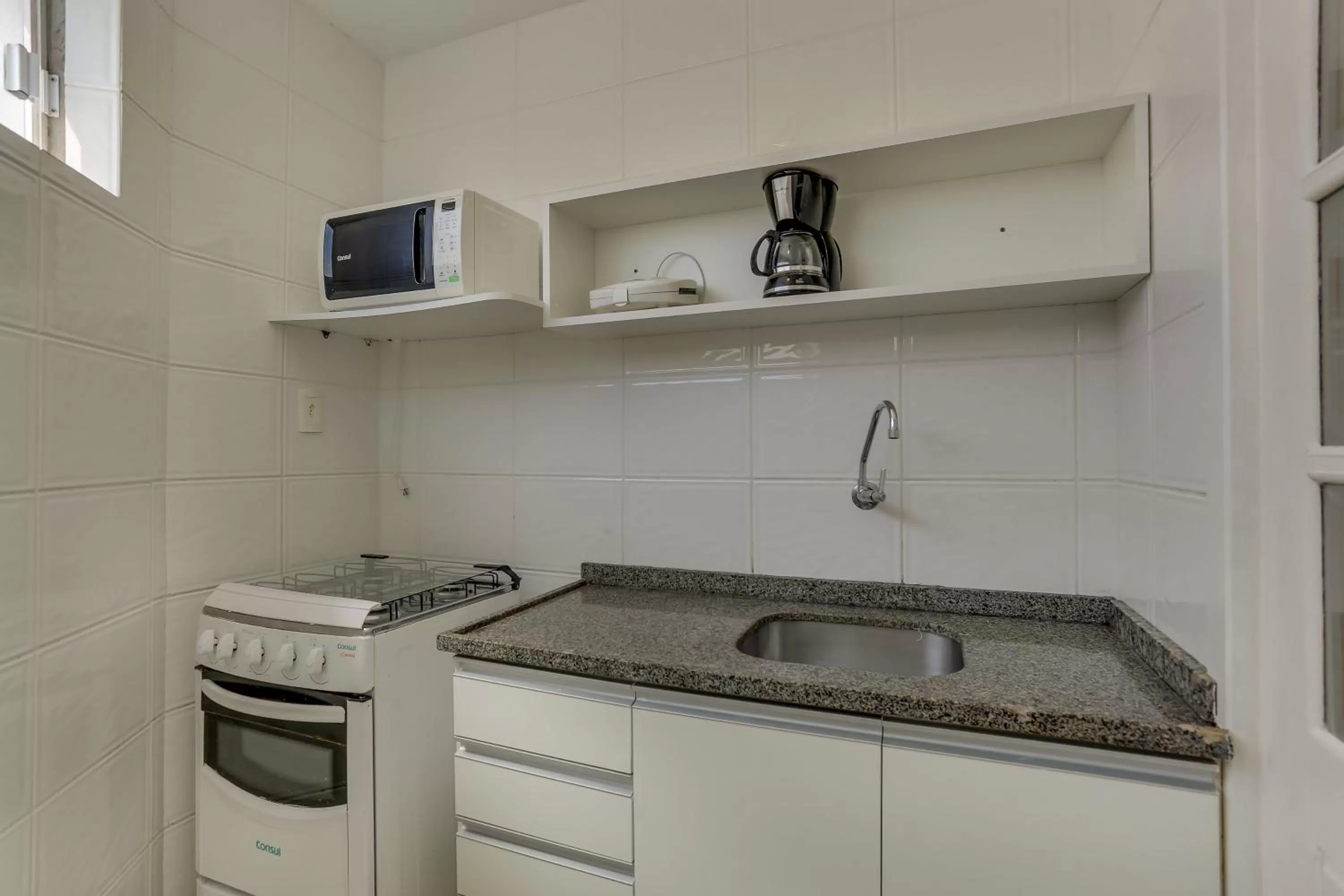 Kitchen or kitchenette in Pousada Saint Paul