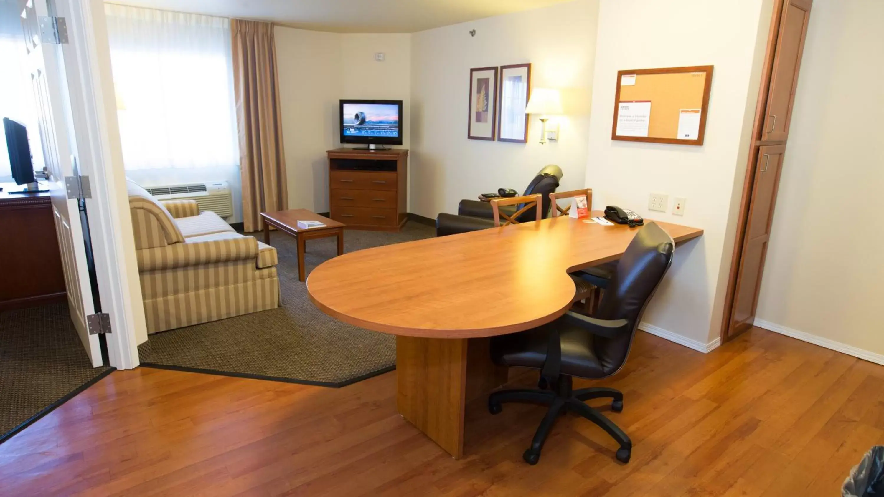 Bedroom in Candlewood Suites Joplin, an IHG Hotel