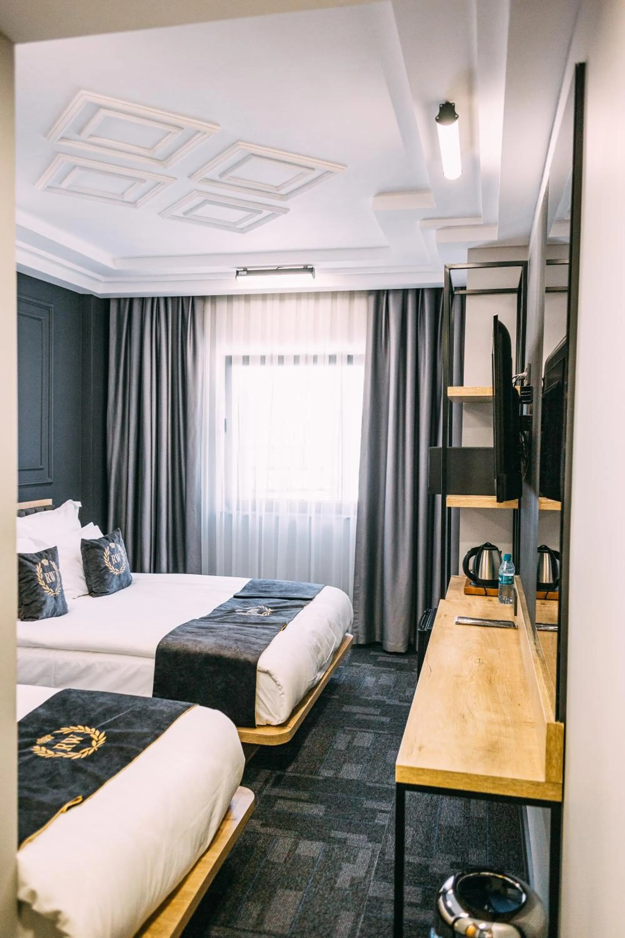 Bed in RW BOUTIQUE HOTEL