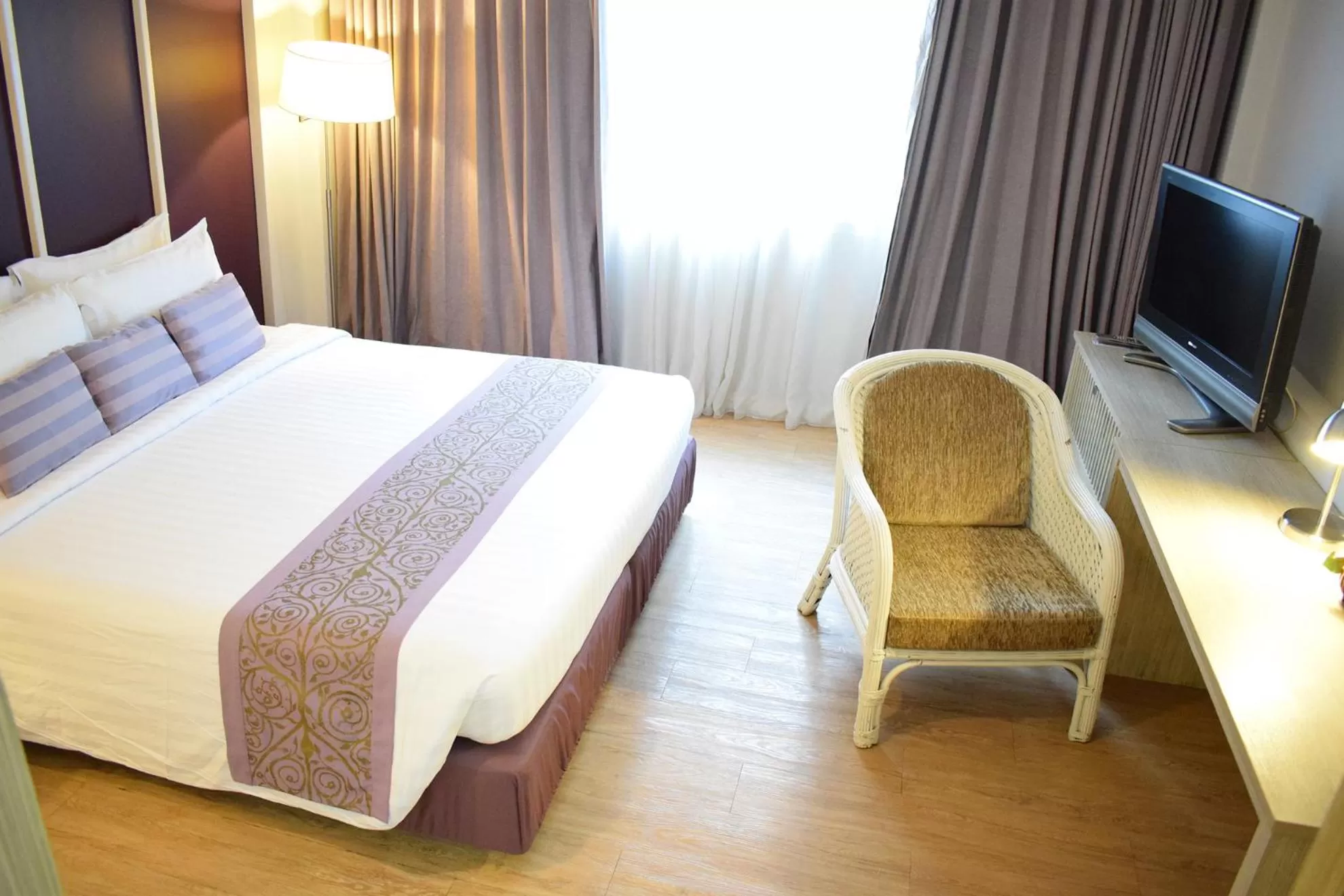 Bed in Trang Hotel Bangkok - SHA Plus