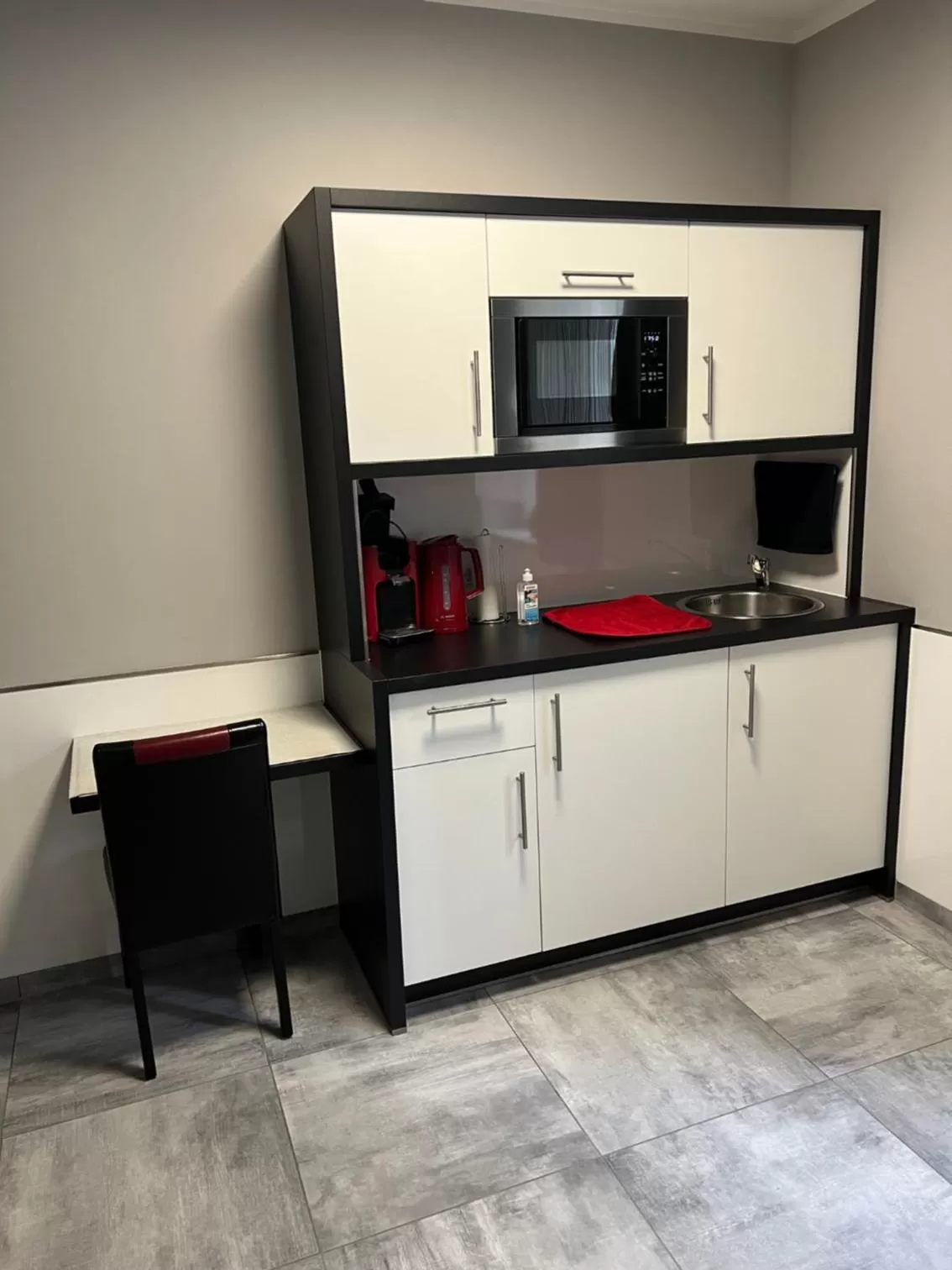 Kitchen or kitchenette in Garni Hotel Eastside