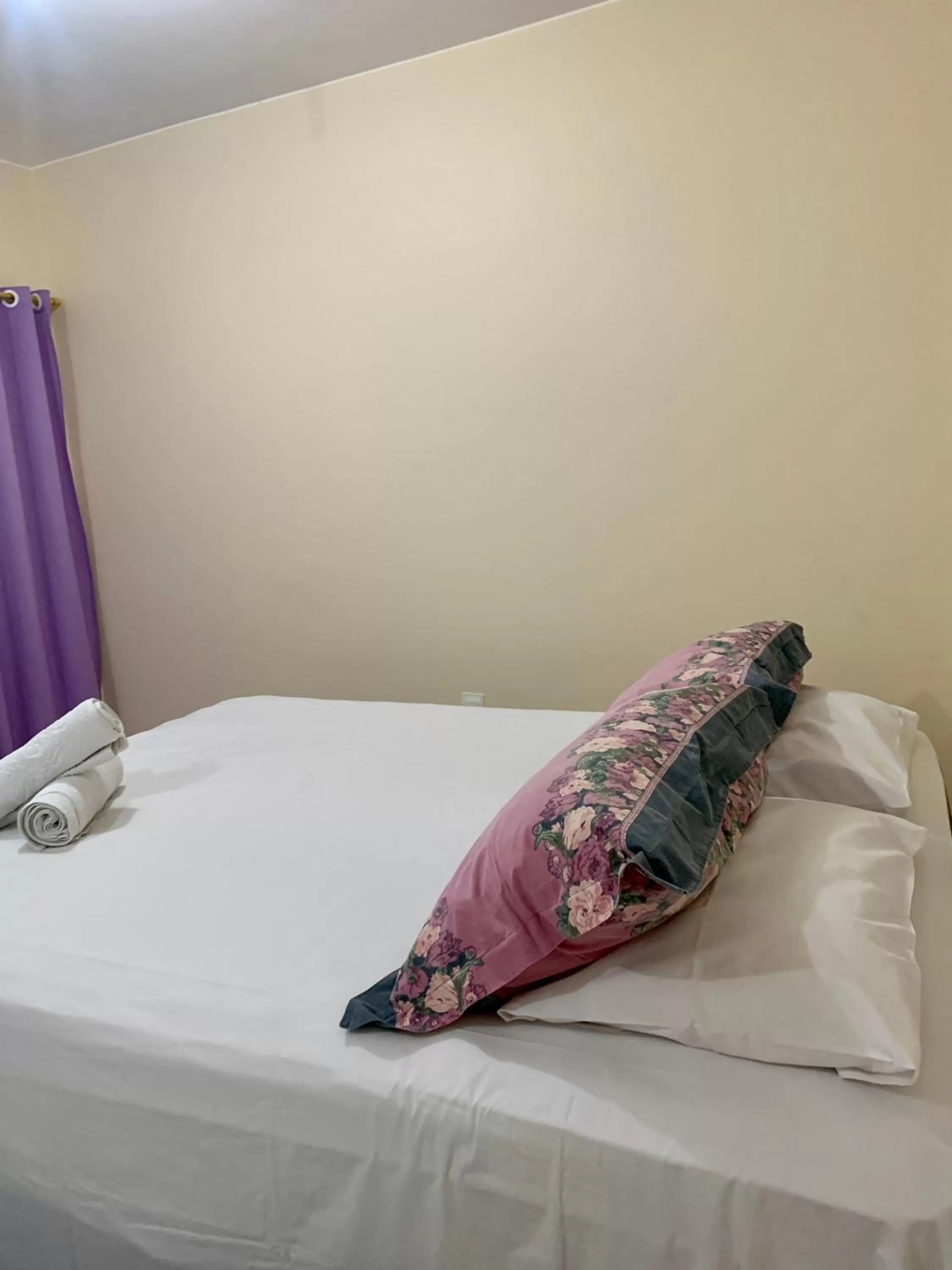 Bed in Pousada Jardim Brasília