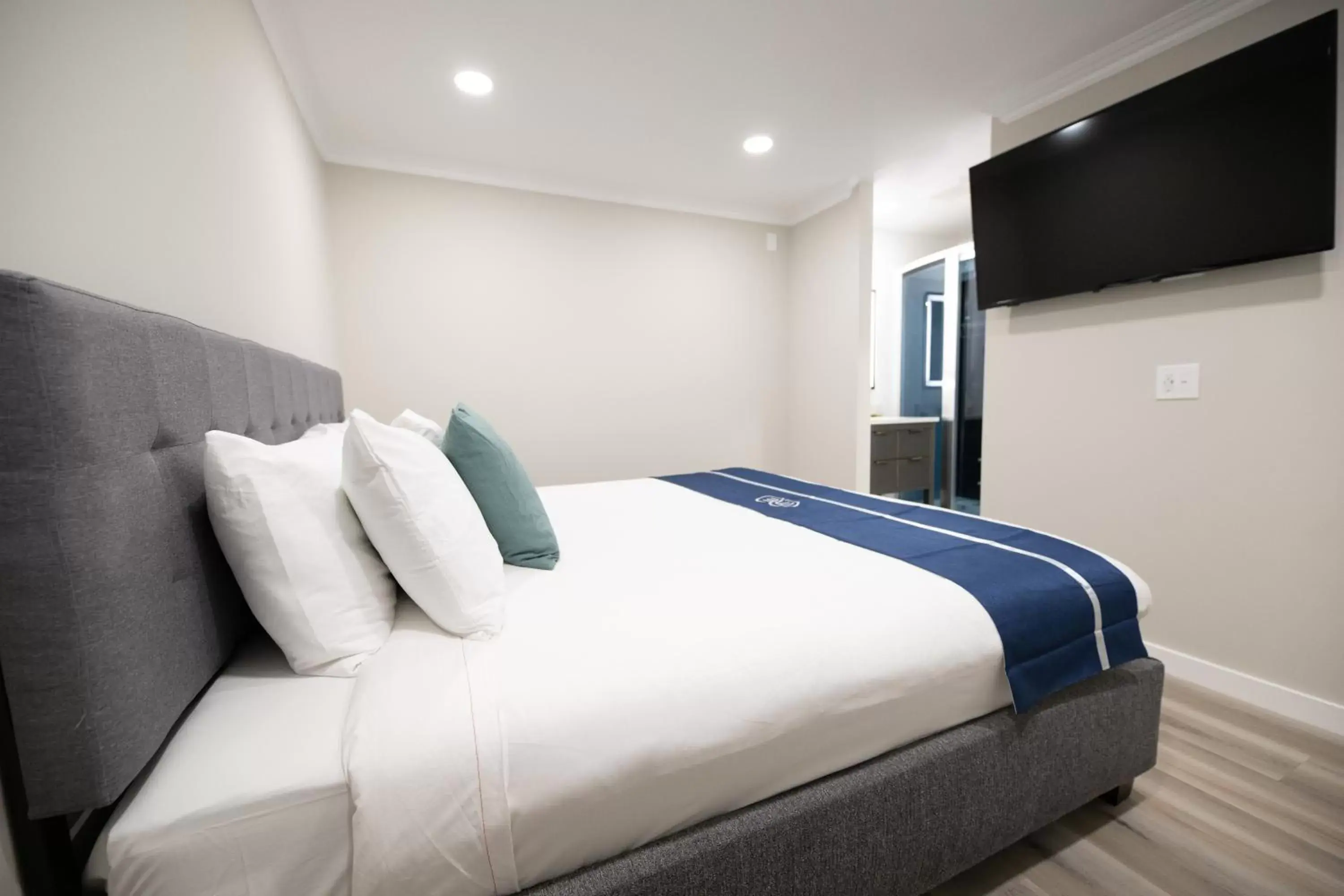 Bed in Omeo Suites