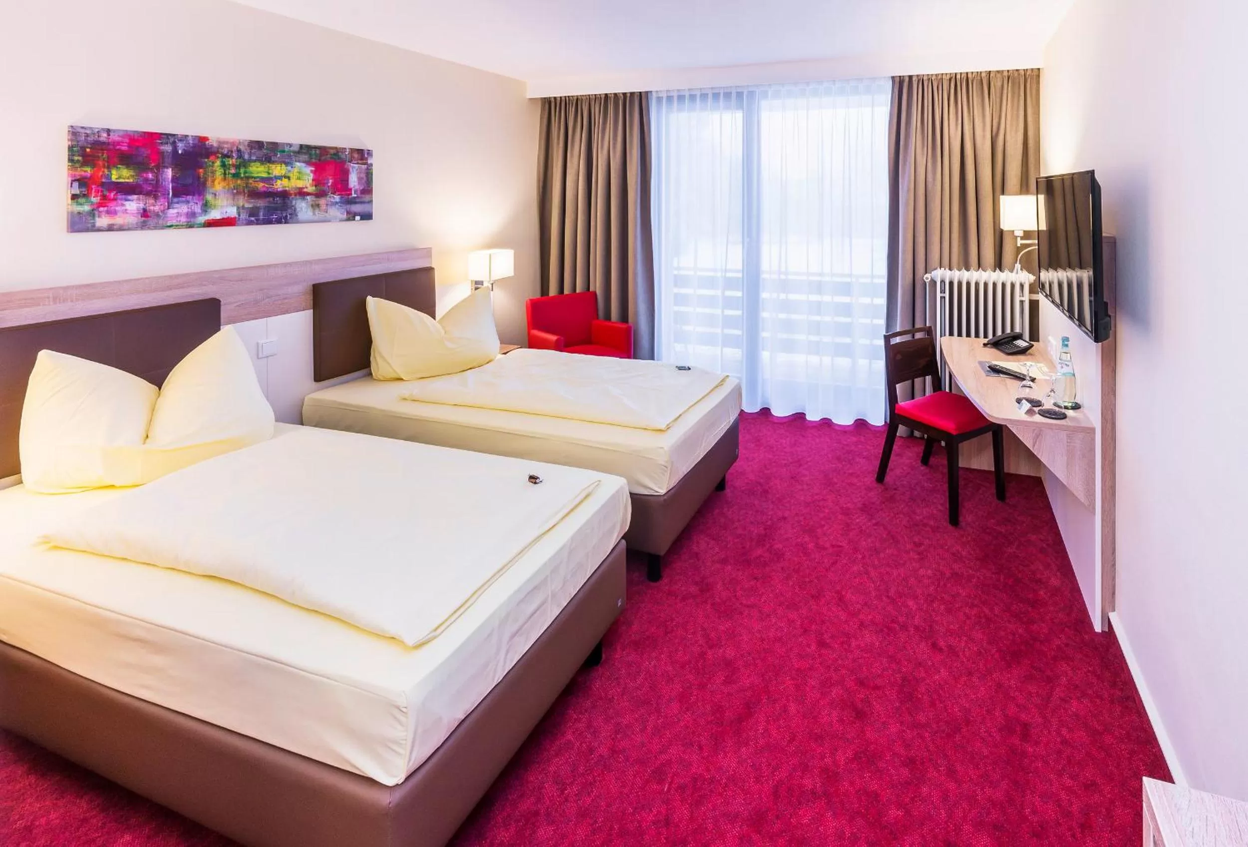 Photo of the whole room, Bed in Montana Landhotel Gummersbach-Nord