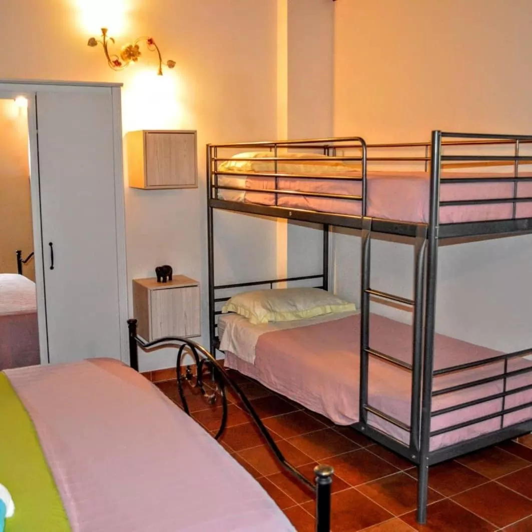 Bed in B&B Le Anthos