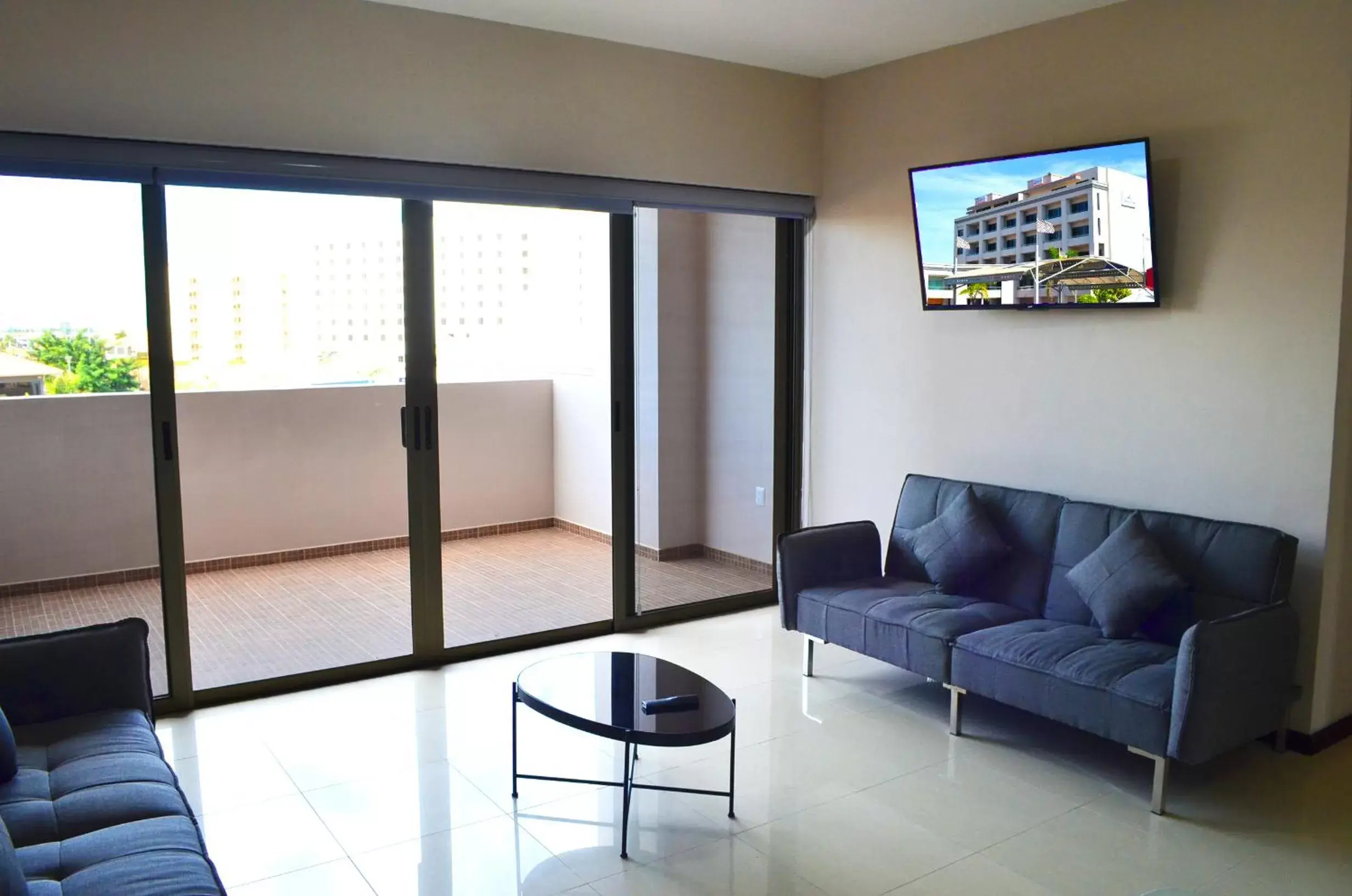 Communal lounge/ TV room, Seating Area in Bahia Marina Departamentos