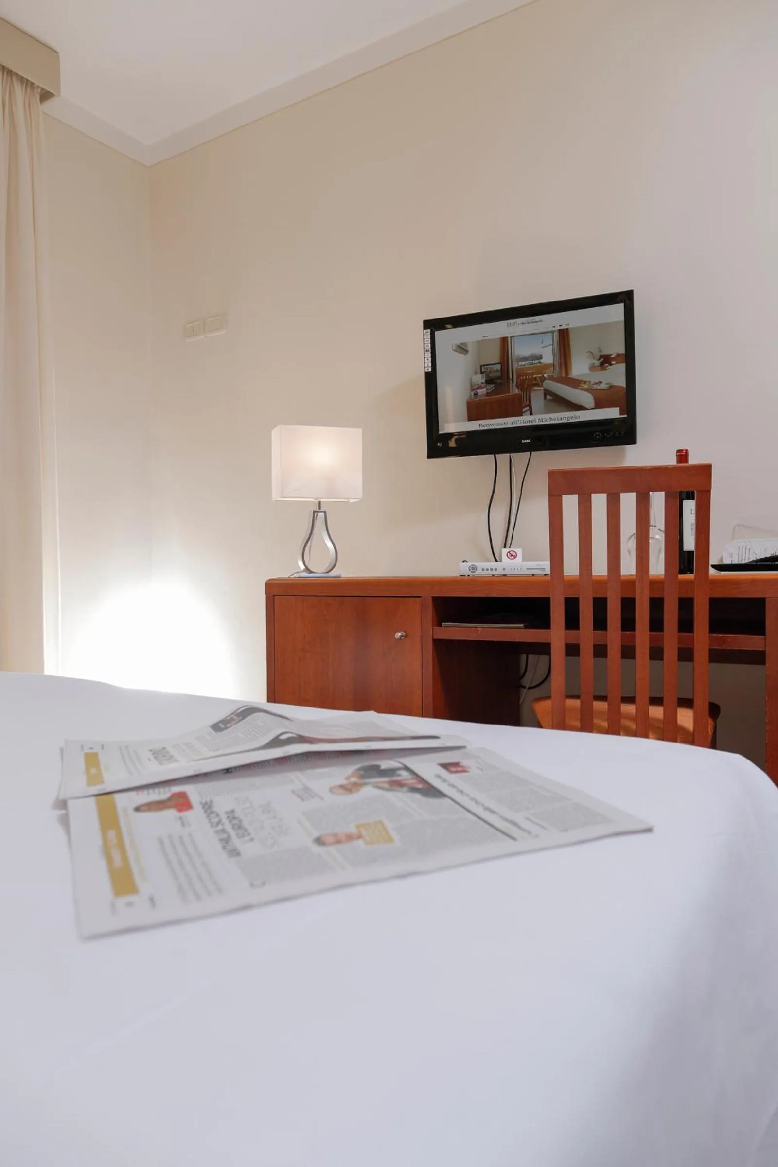 Bed in Hotel Michelangelo