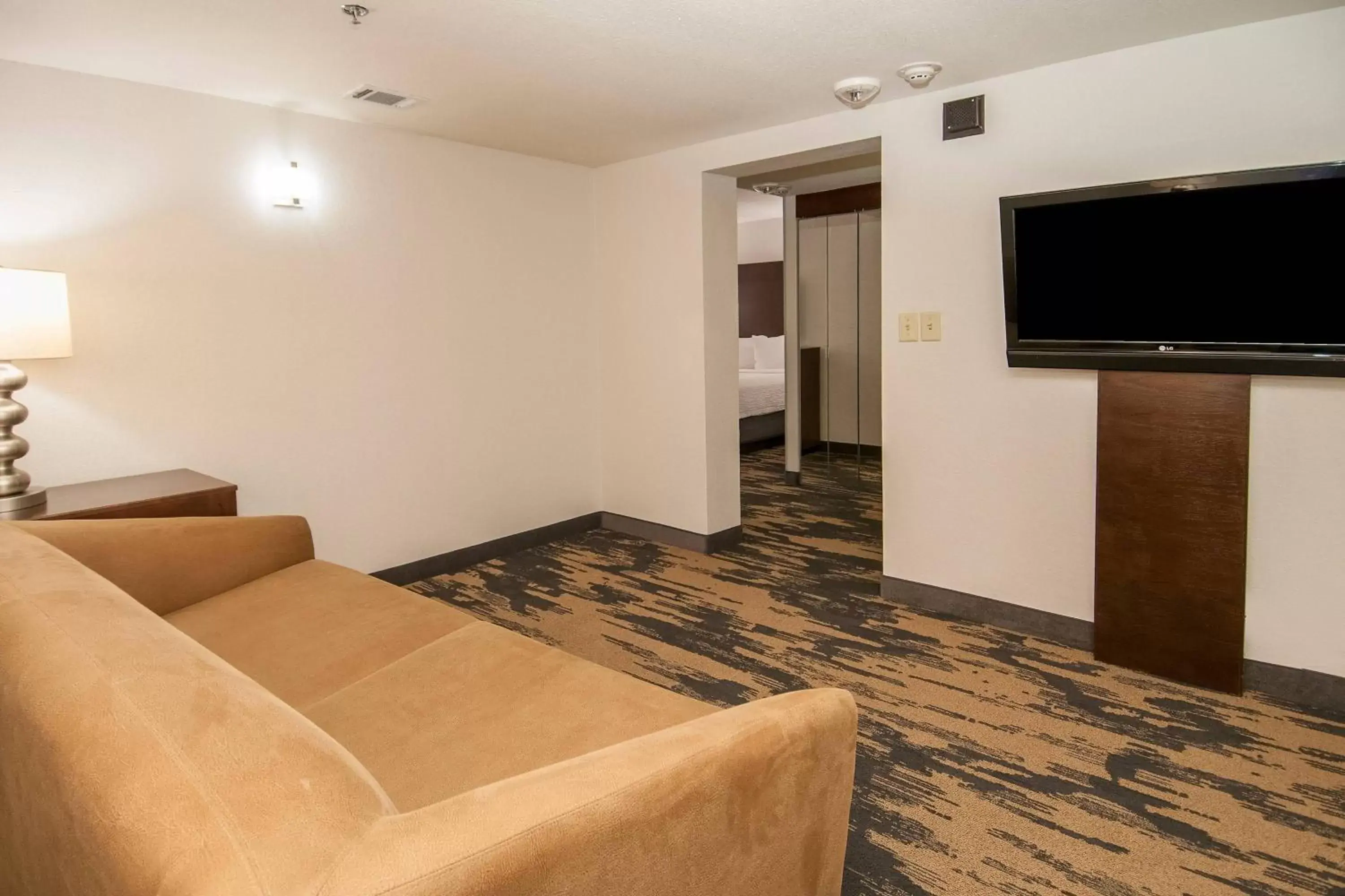 Photo of the whole room, TV/Entertainment Center in Fairfield Inn & Suites by Marriott Dallas DFW Airport South/Irving