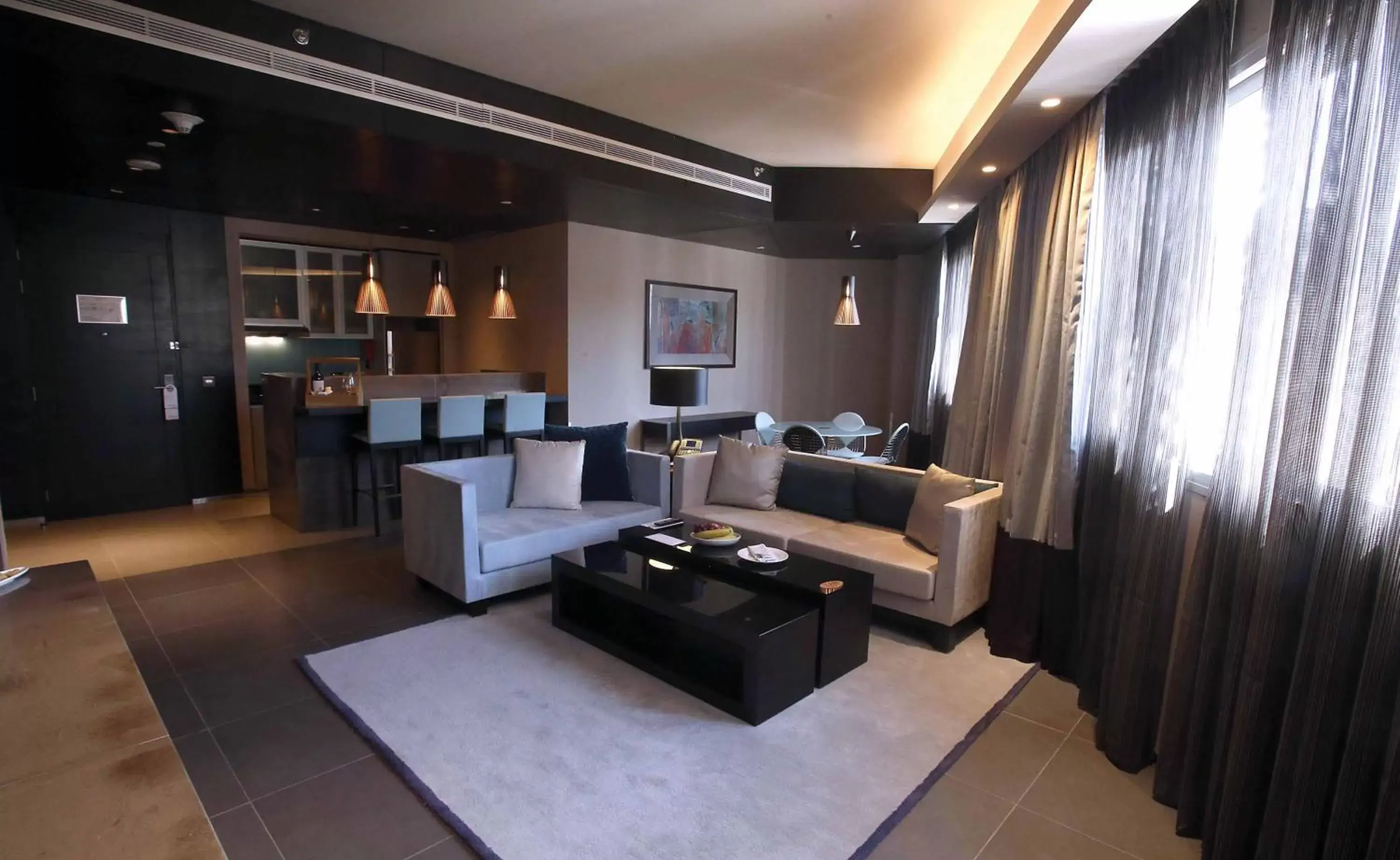Living room, Seating Area in The Boulevard Arjaan by Rotana