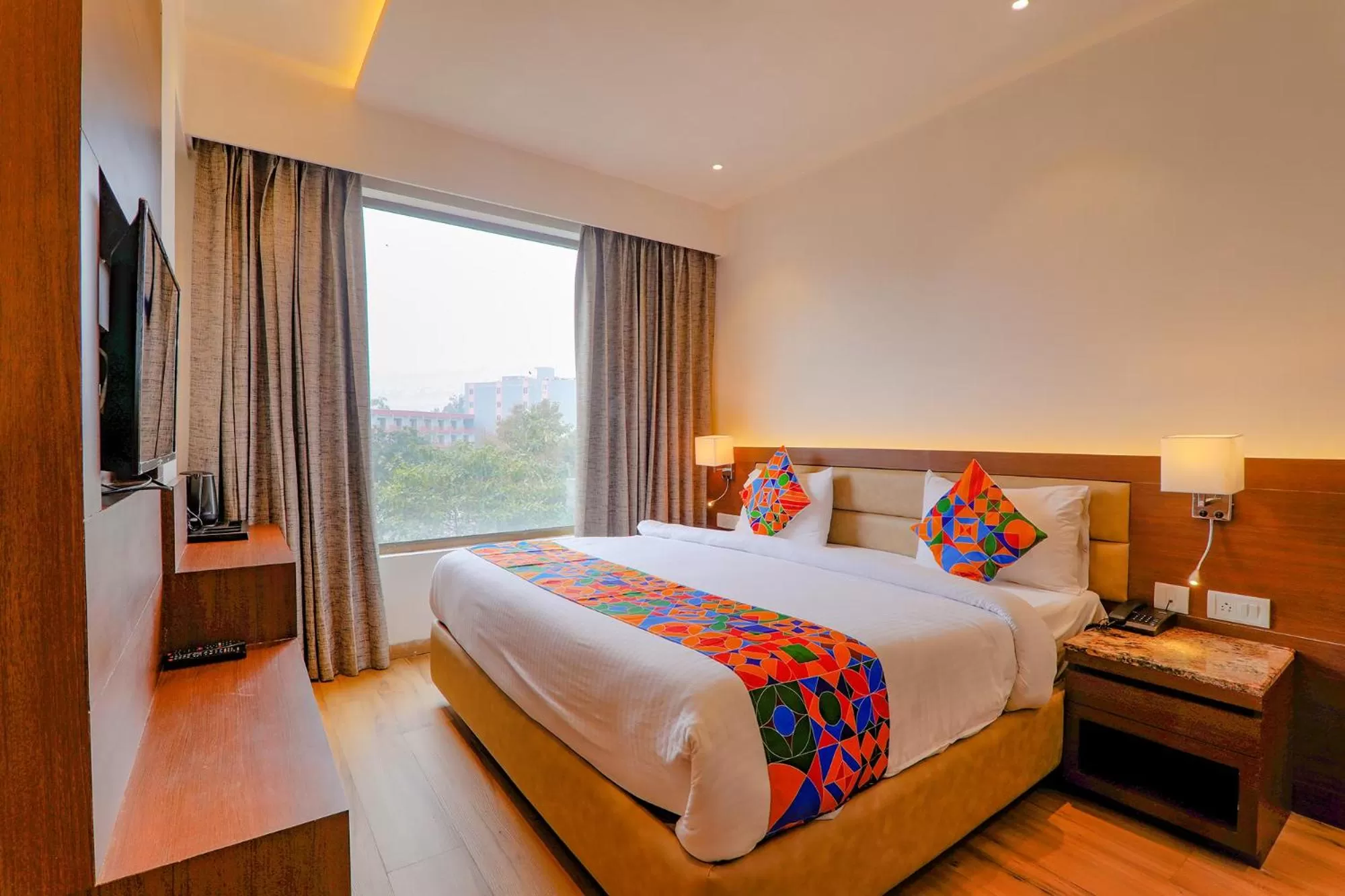 Bed in FabHotel Aurelia Grand