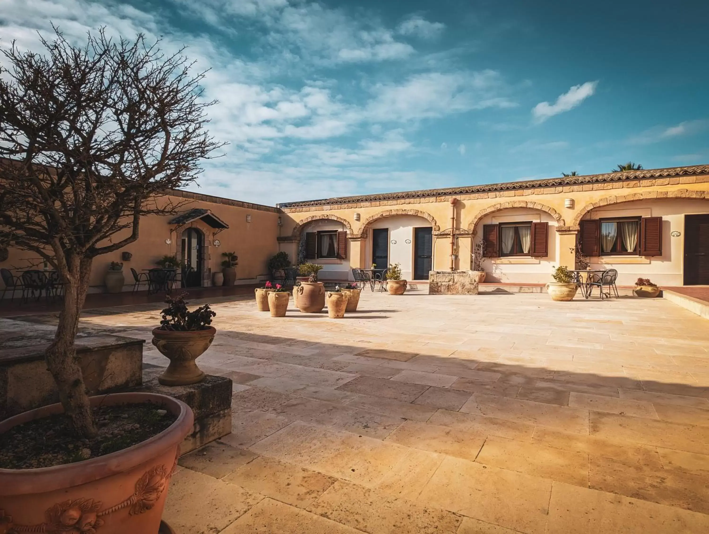 Inner courtyard view, Property Building in Hotel La Corte Del Sole