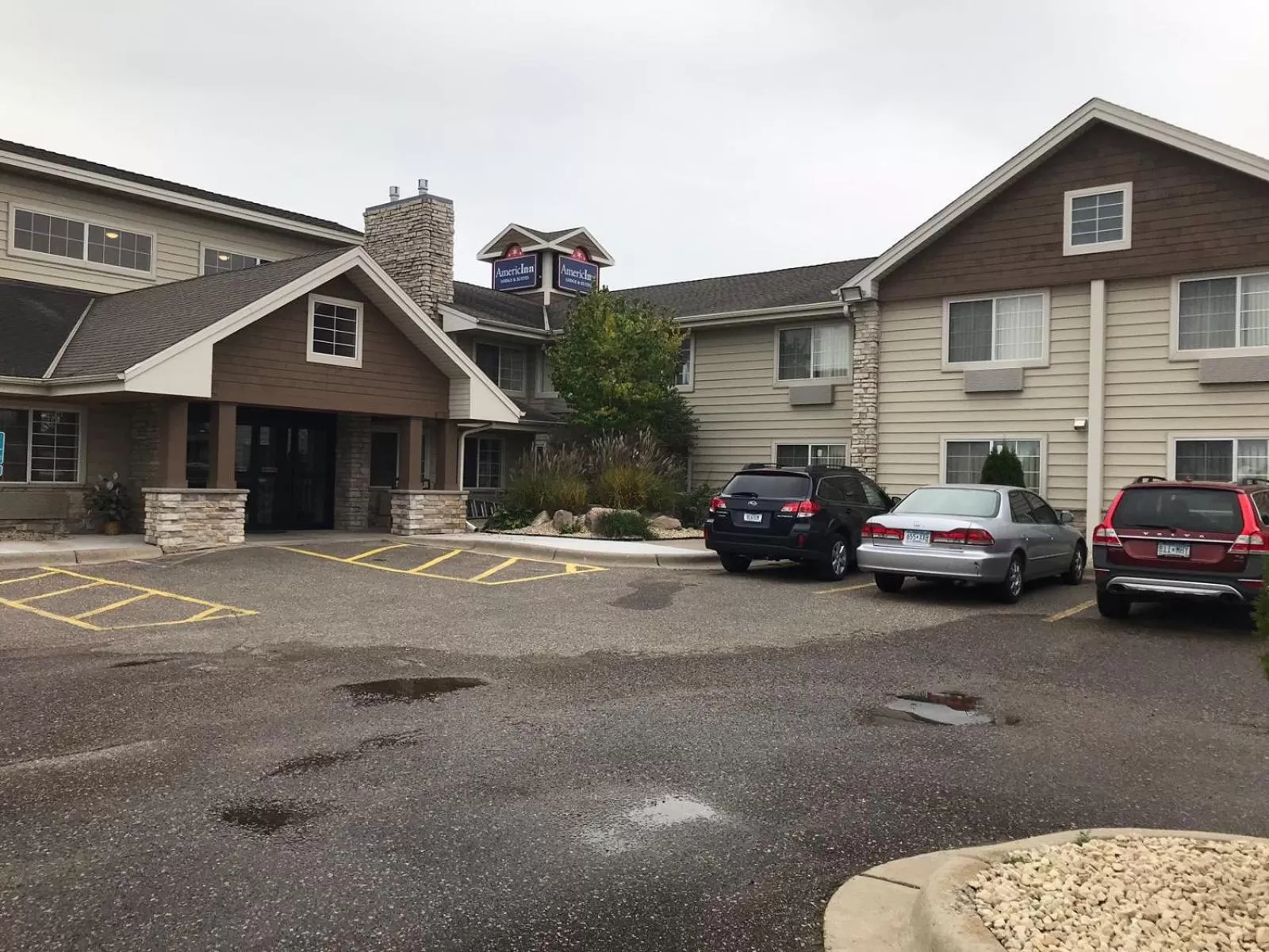 Property building in AmericInn by Wyndham Hotel and Suites Long Lake