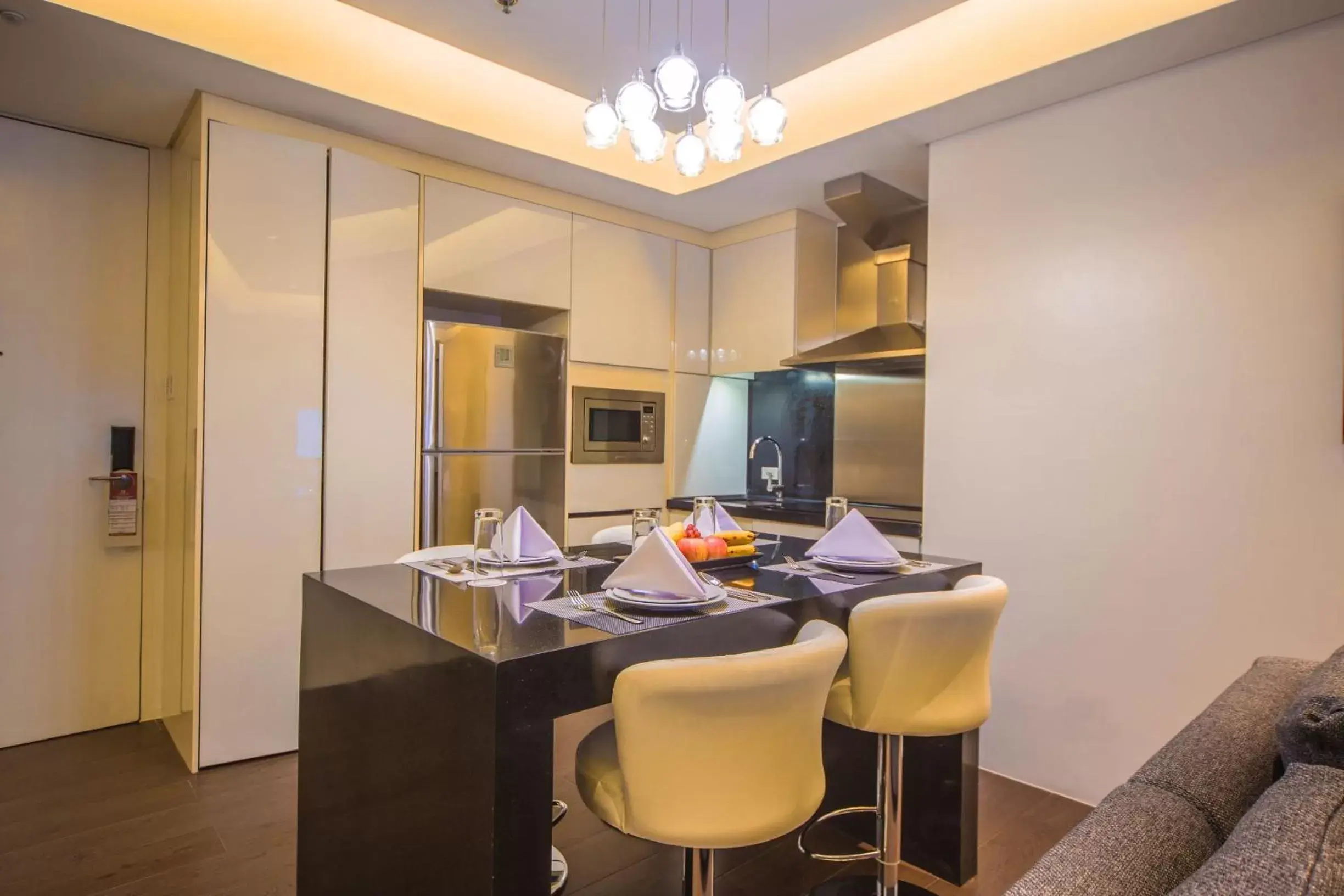 Kitchen or kitchenette, Dining Area in The Alpha Suites