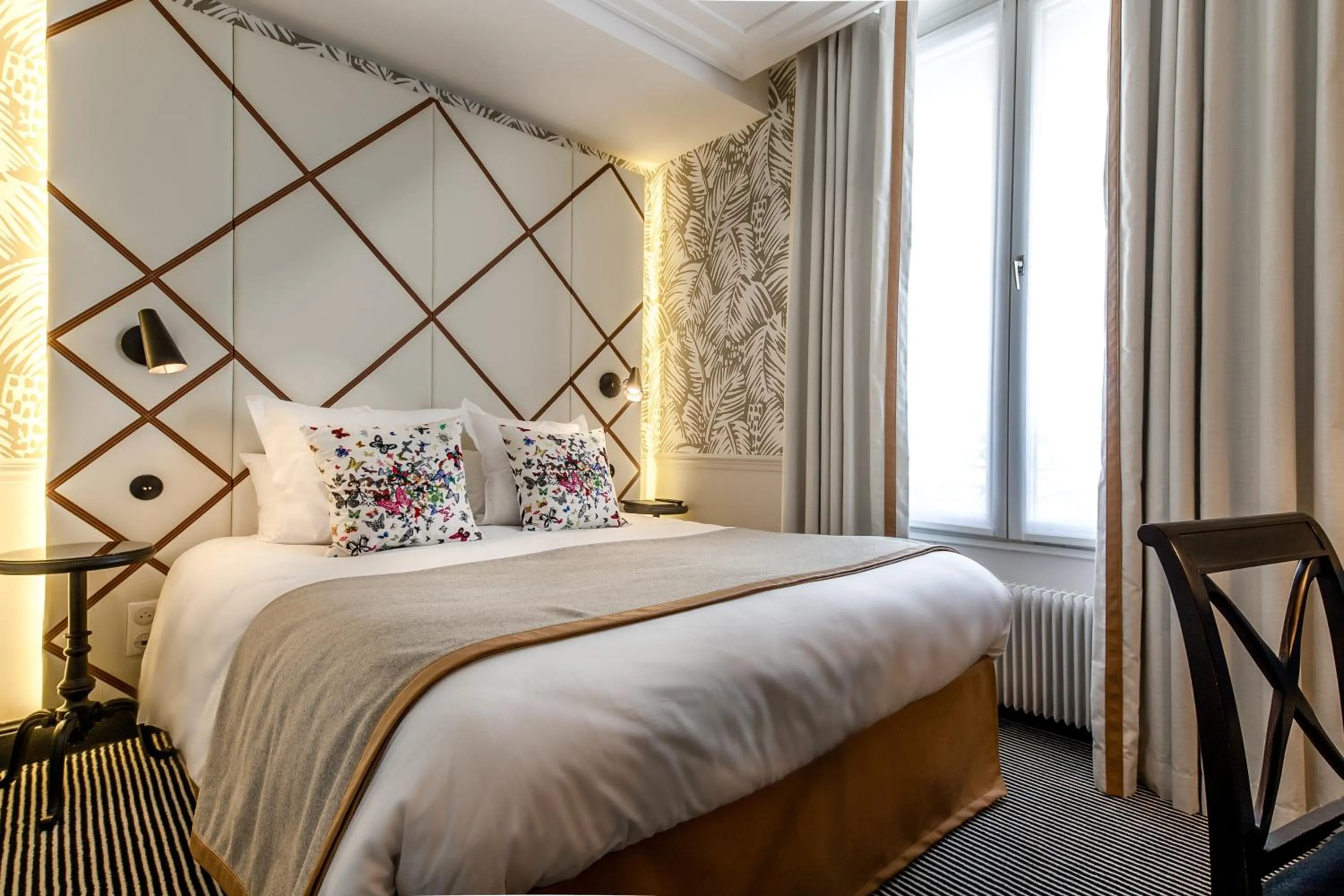 Bed in Hôtel Jardin Le Bréa