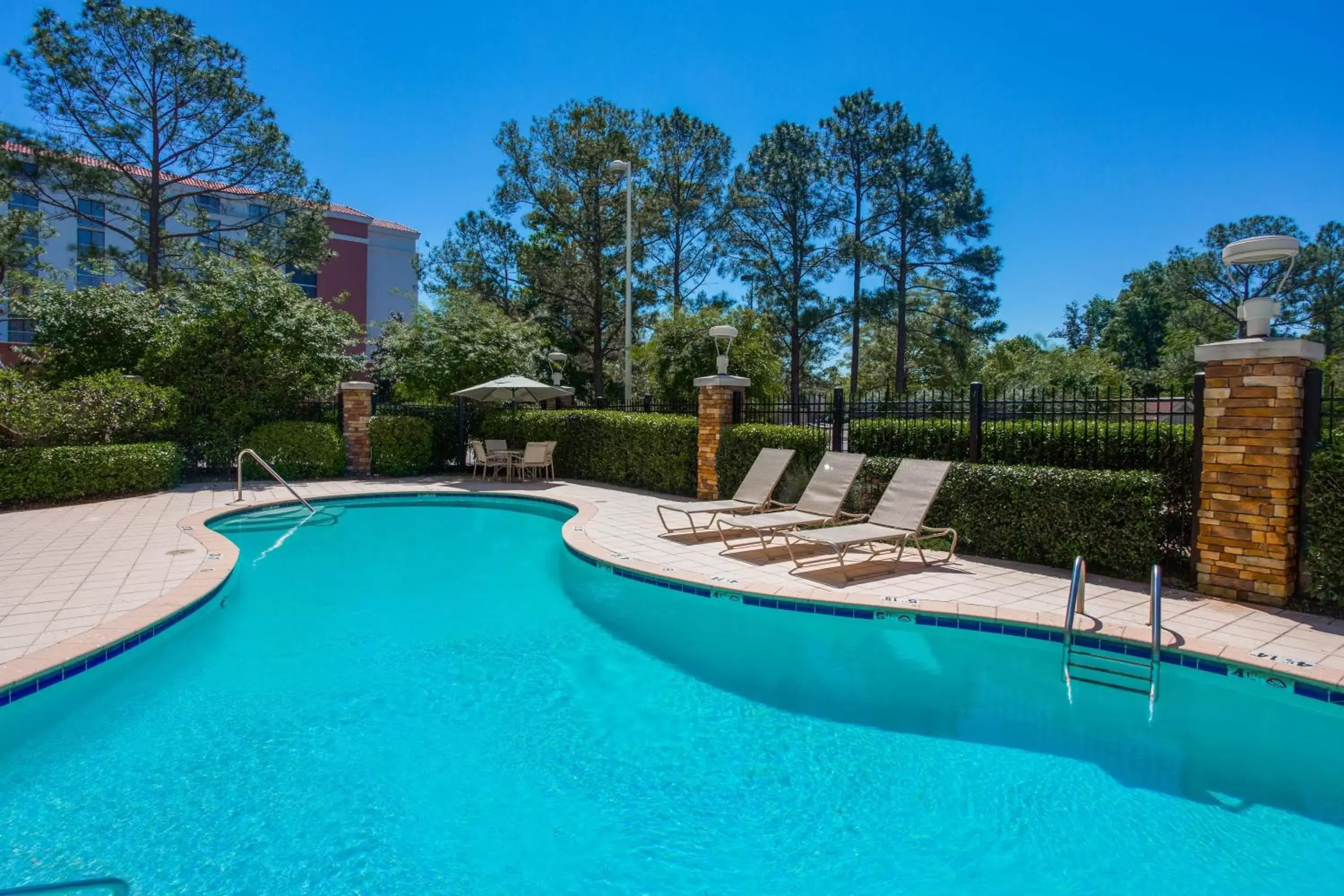 Swimming Pool in Holiday Inn Baton Rouge College Drive I-10, an IHG Hotel