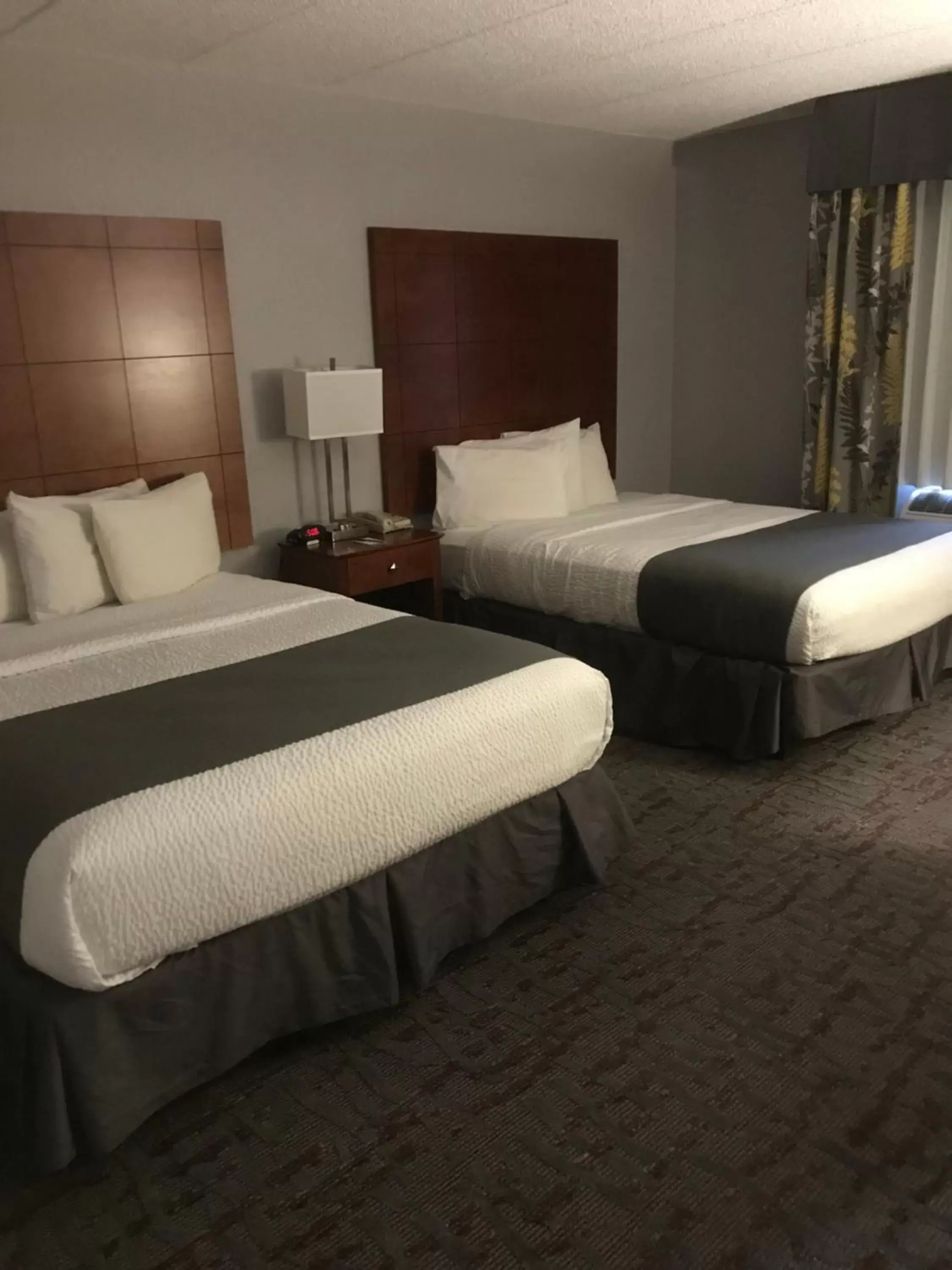 Bed in AmericInn by Wyndham Ankeny/Des Moines