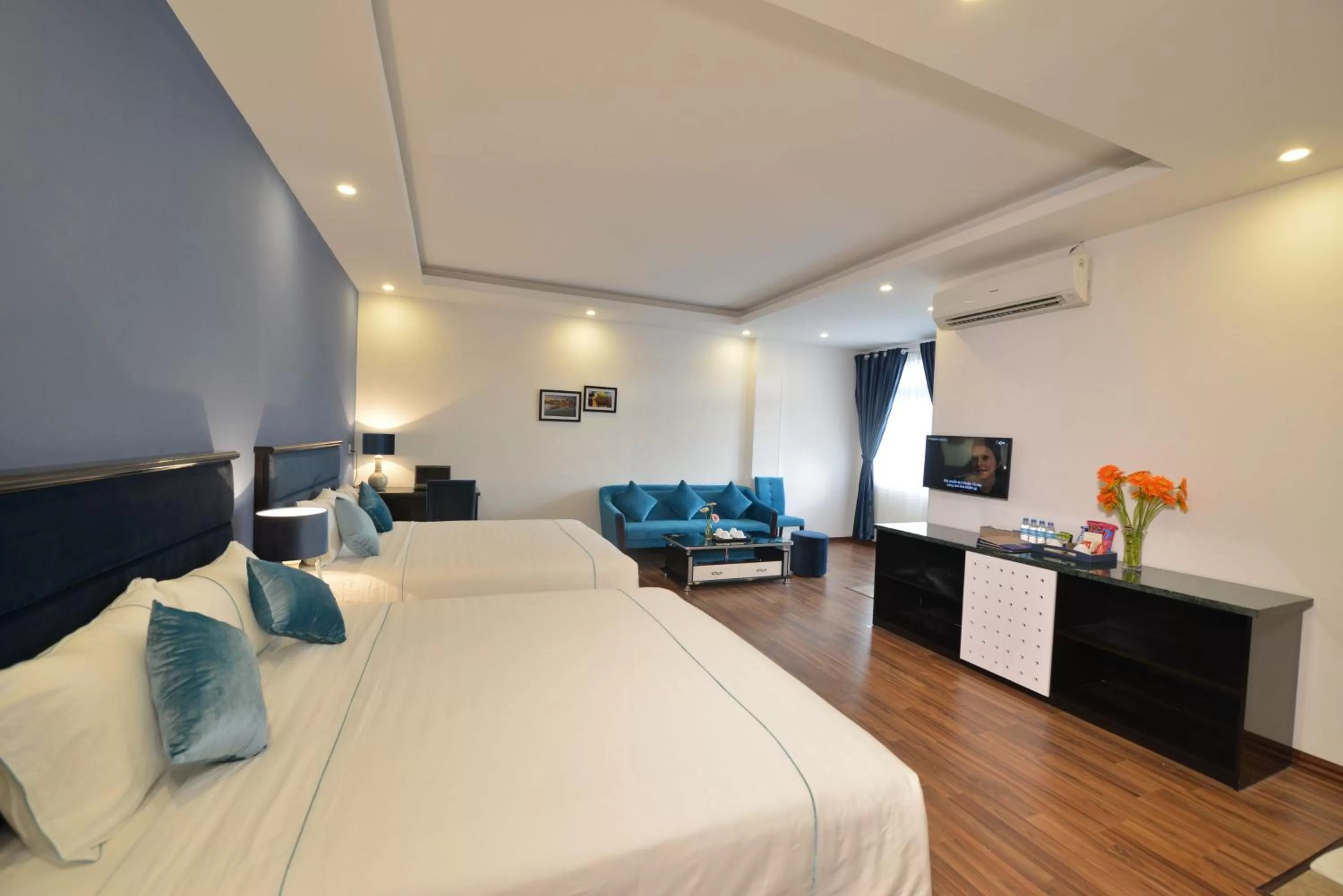 Photo of the whole room, Bed in TTC Hotel - Hoi An