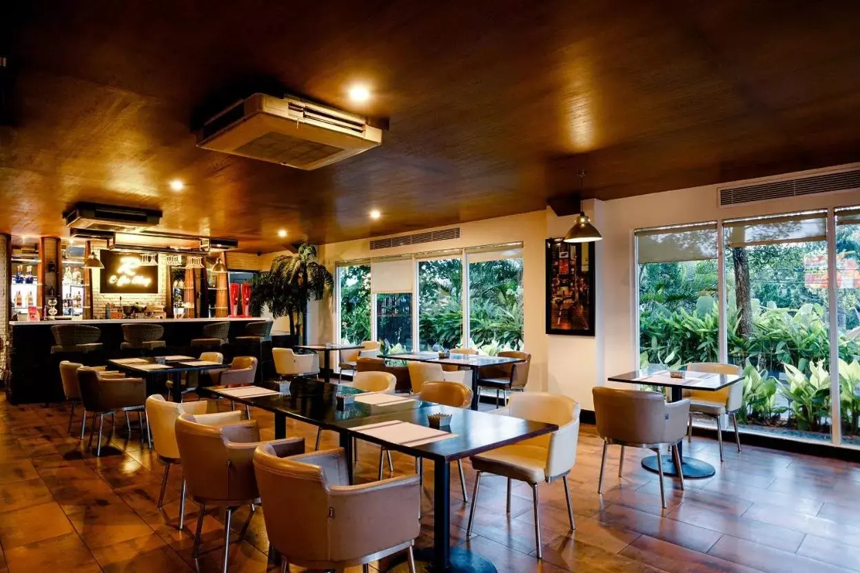 Lounge or bar in Emersia Hotel and Resort Lounge or bar in Emersia Hotel and Resort