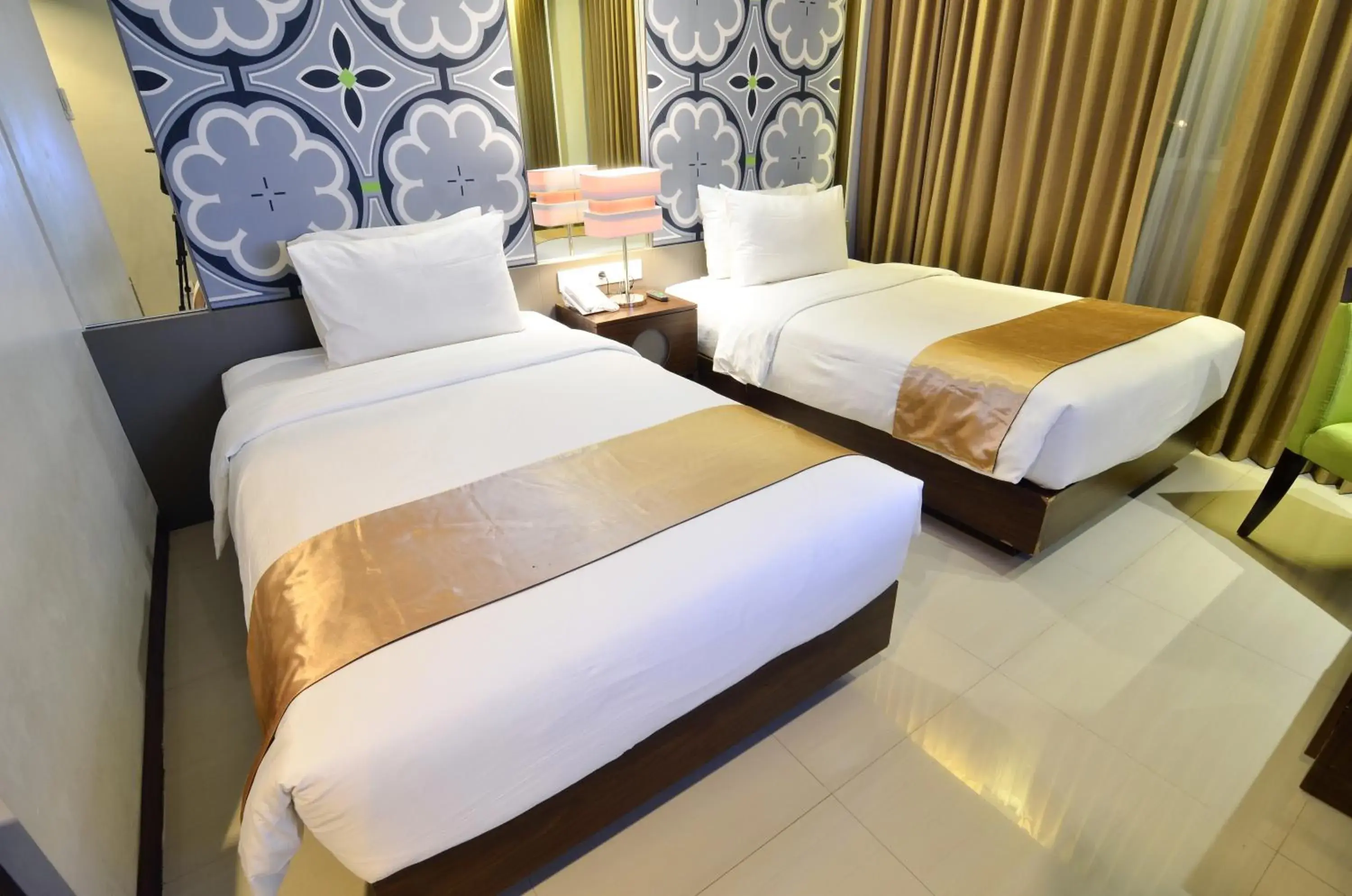 Bed in Howard Johnson By Wyndham Pekalongan