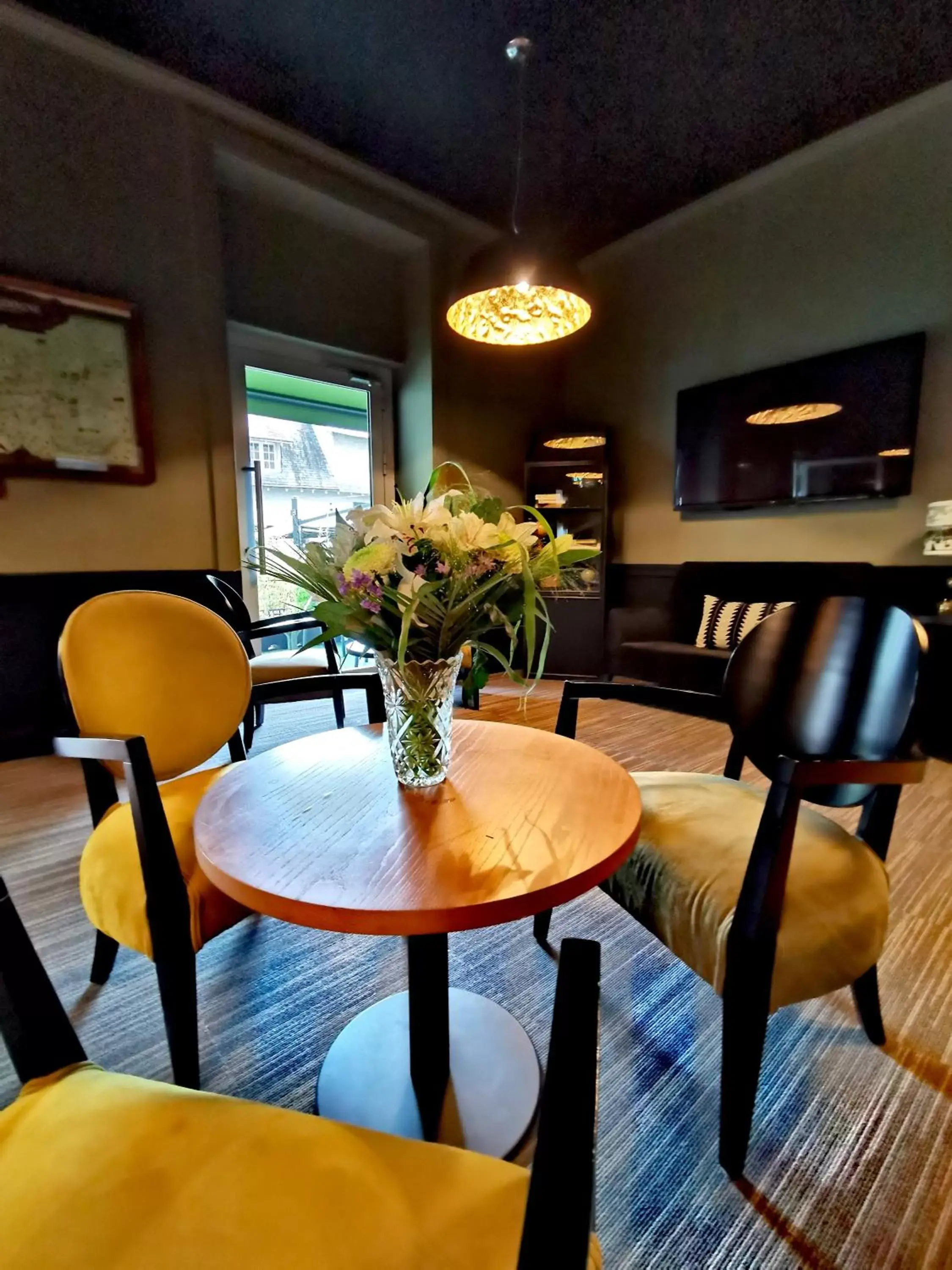 Communal lounge/ TV room, Seating Area in Grand Hôtel Brive