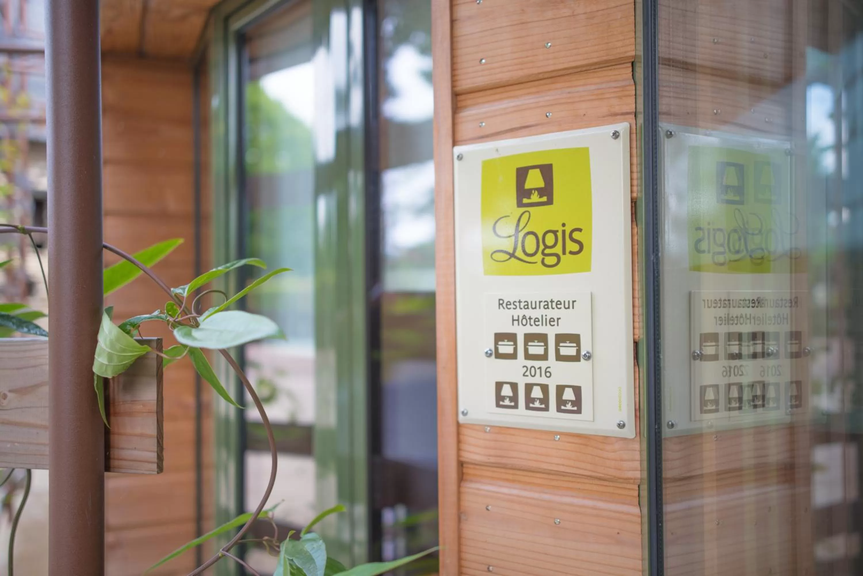 Property logo or sign in Logis Hôtel Domaine du Moulin Cavier - Restaurants & Spa