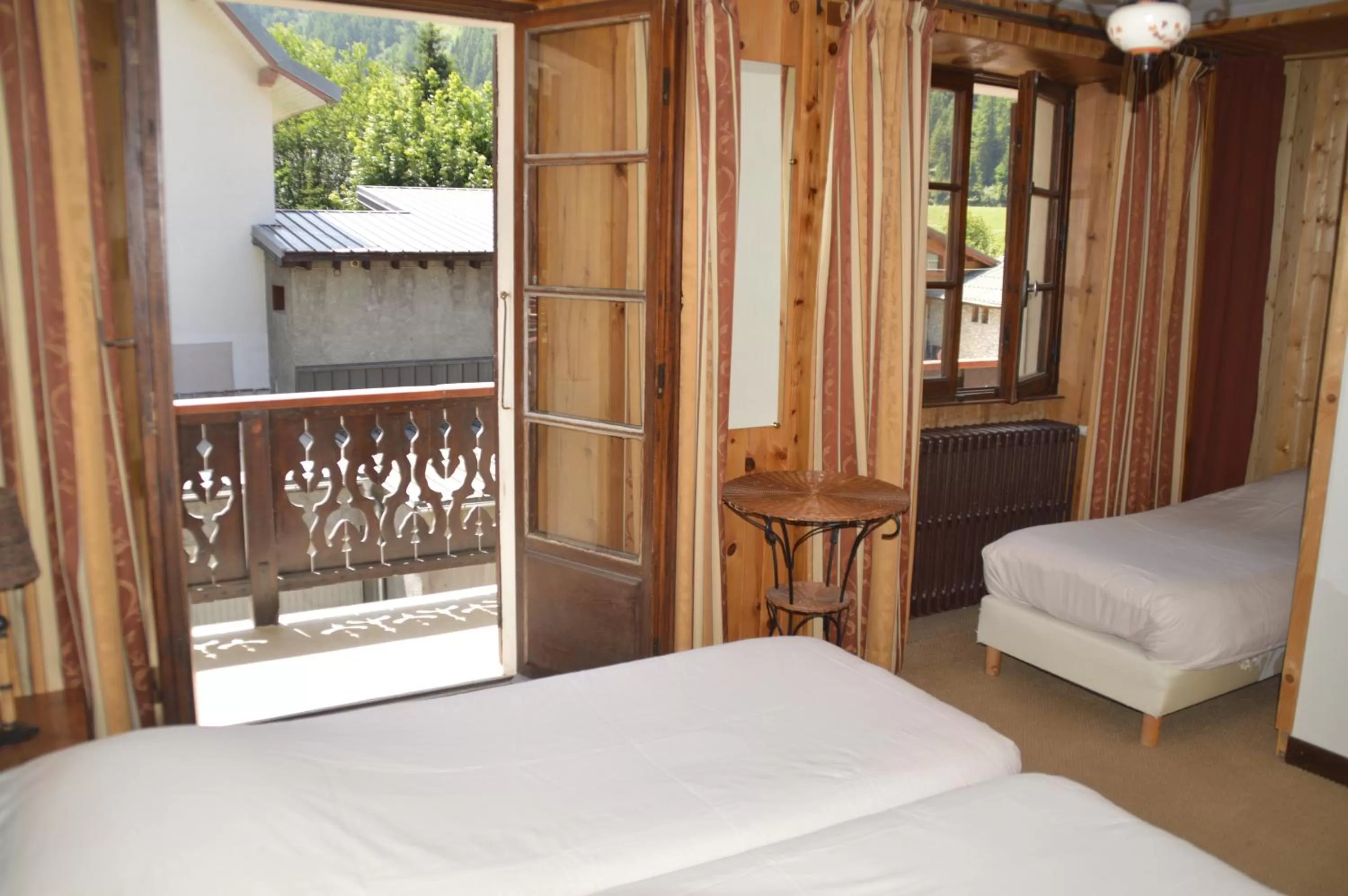 Bed in Hotel Le Genepy