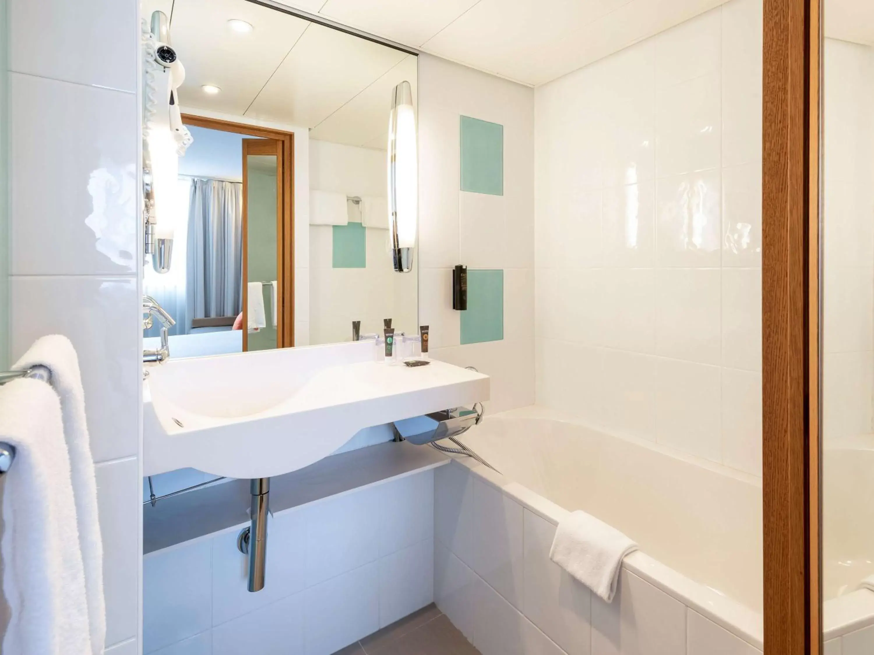 Photo of the whole room, Bathroom in Novotel Bern Expo - NEWLY RENOVATED!