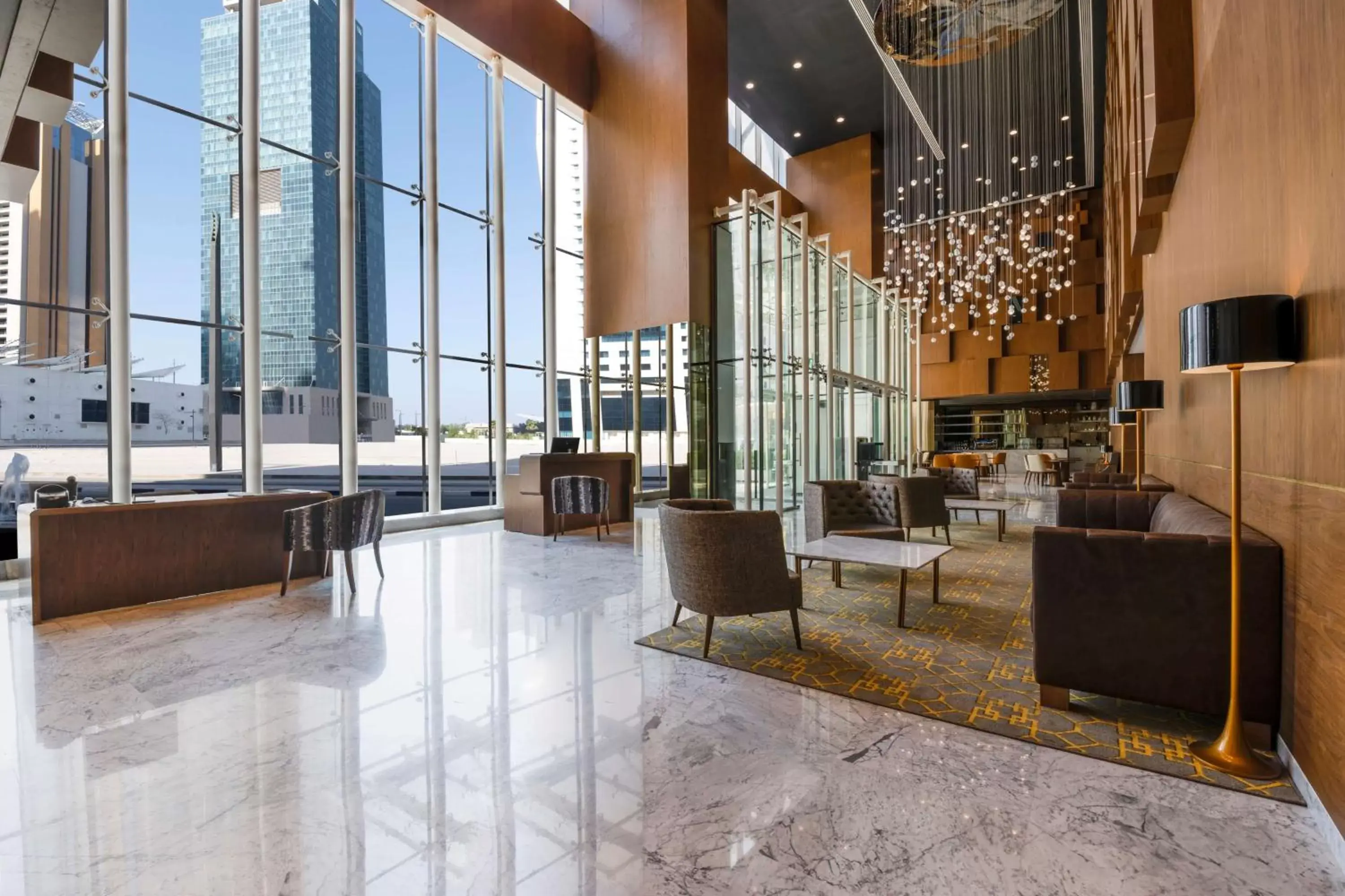 Lobby or reception in Aleph Doha Residences, Curio Collection By Hilton