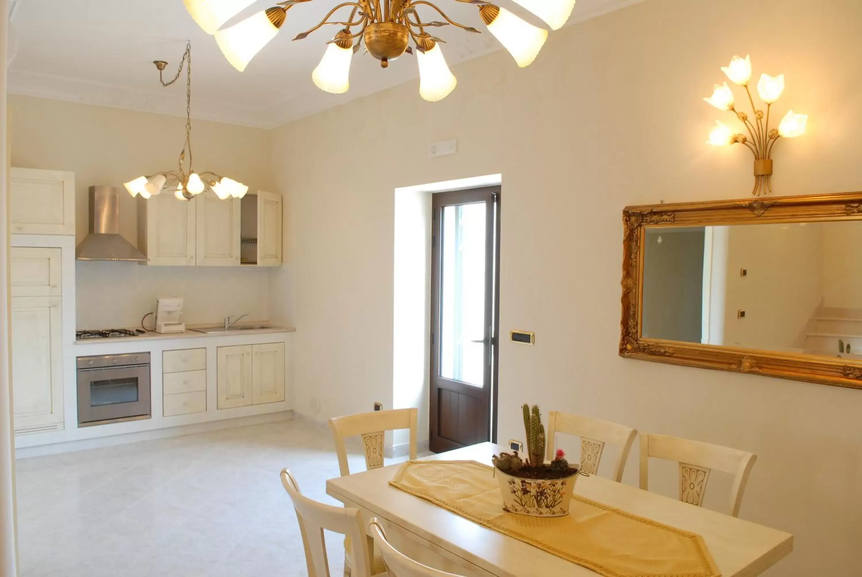 Living room, Kitchen/Kitchenette in Villa Caramia