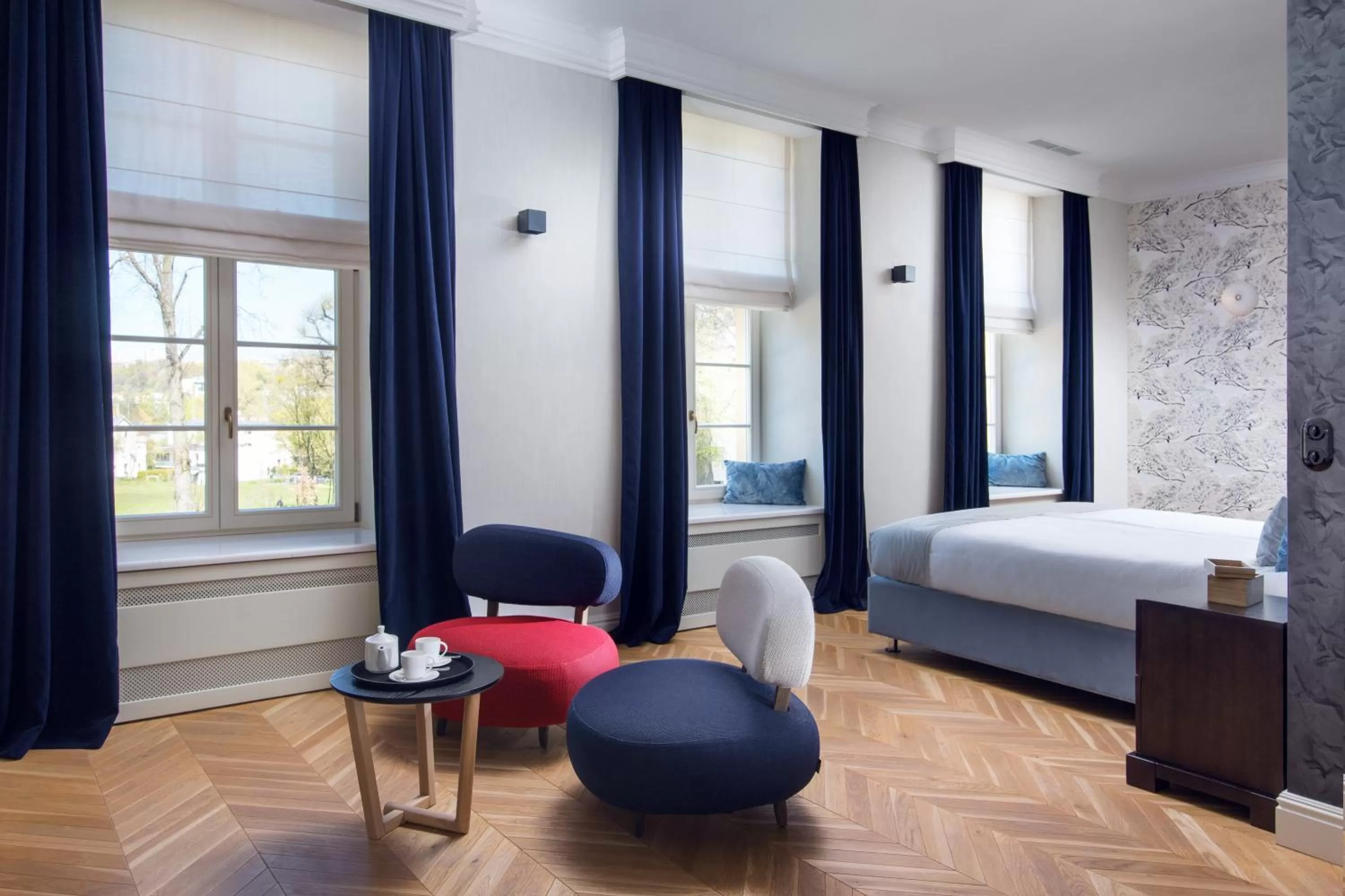 Living room, Bed in Relais & Châteaux Hotel Quadrille - Adults Only