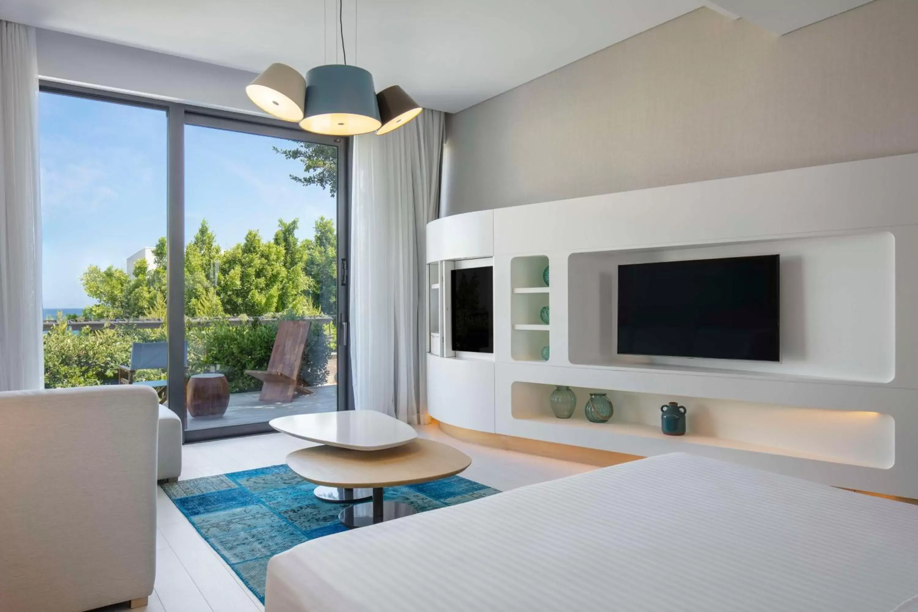 Bed, TV/Entertainment Center in Susona Bodrum, LXR Hotels & Resorts