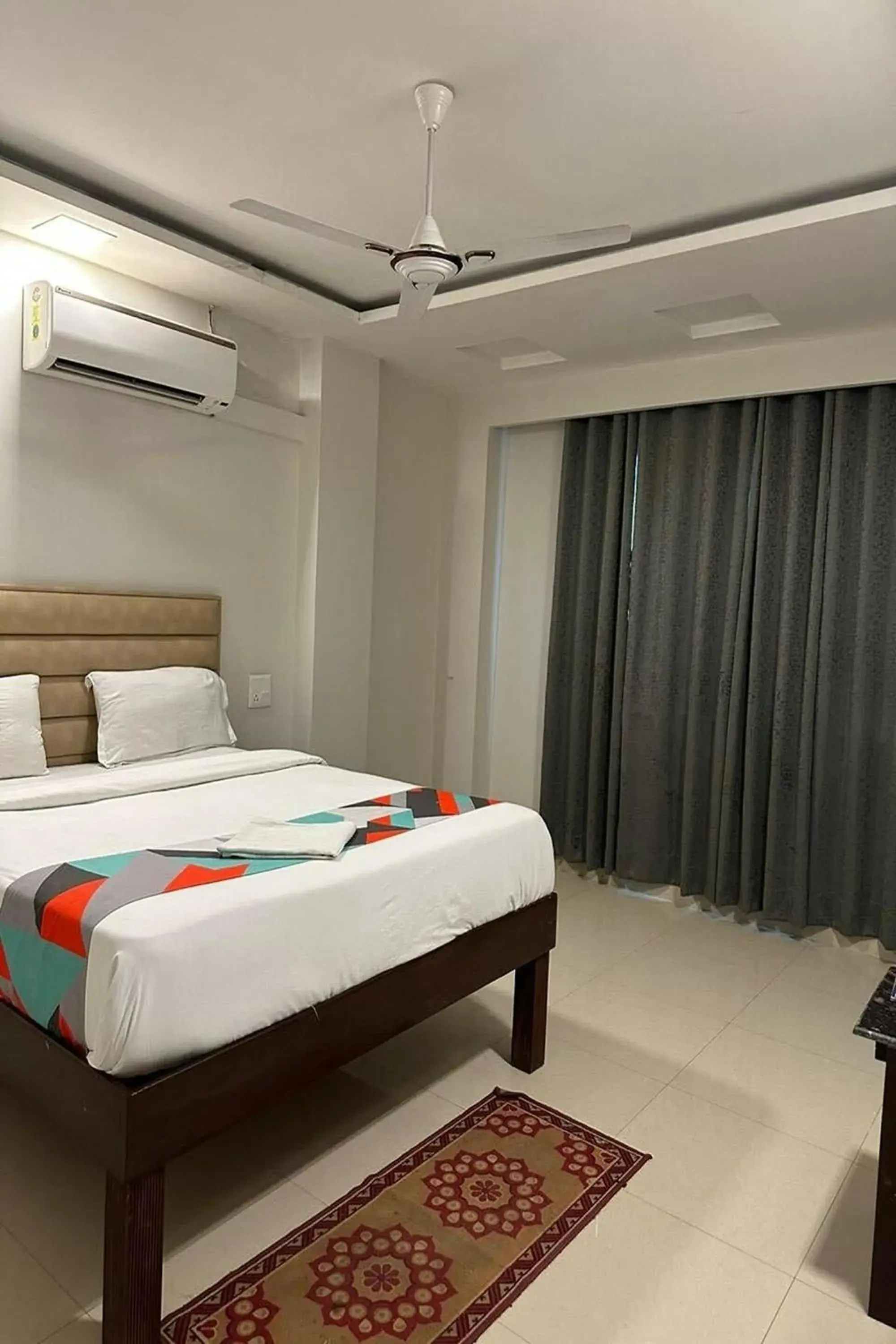 Bed in Hotel Amenda International