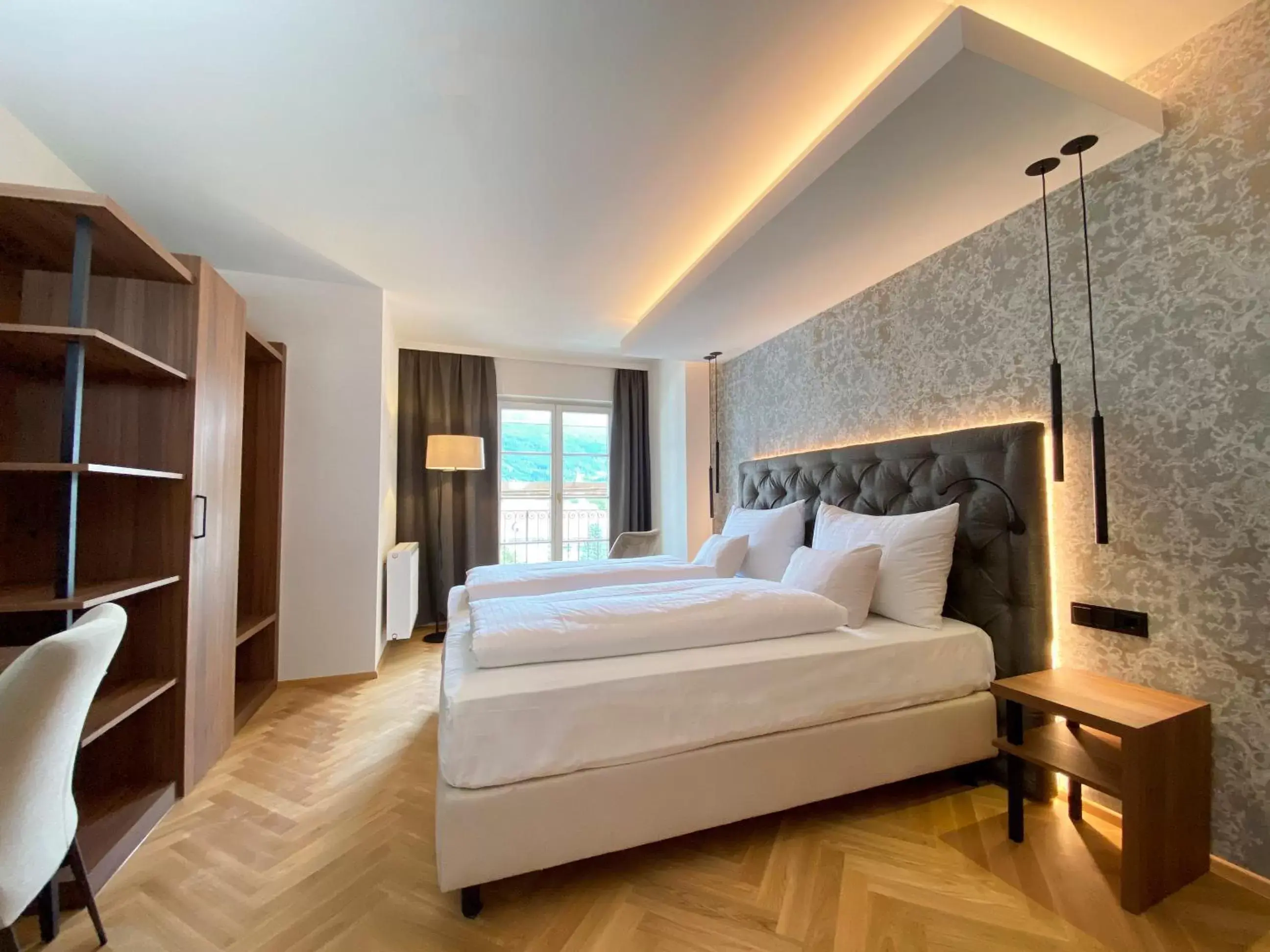 Bedroom in Hotel Schwarzer Adler Innsbruck