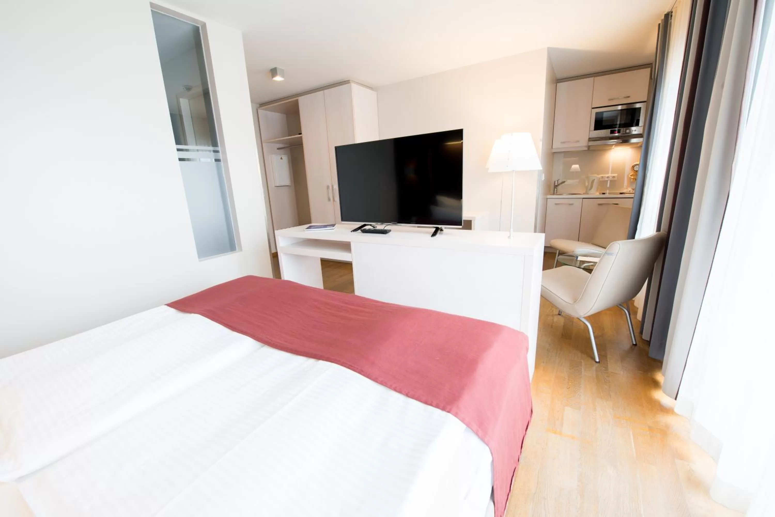 Photo of the whole room, Bed in Nymphe Strandhotel & Apartments