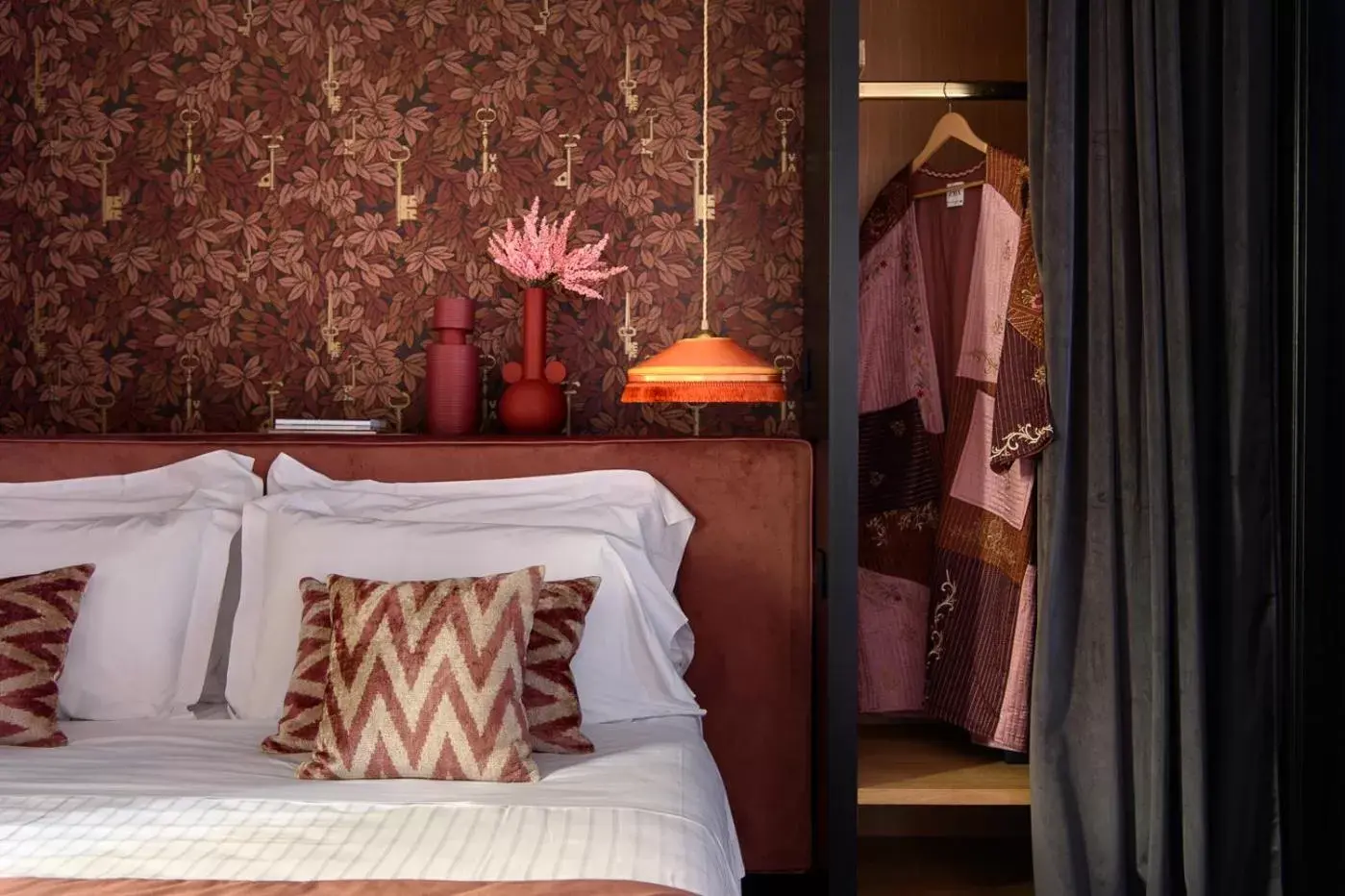 Bed in Velona's Jungle Luxury Suites
